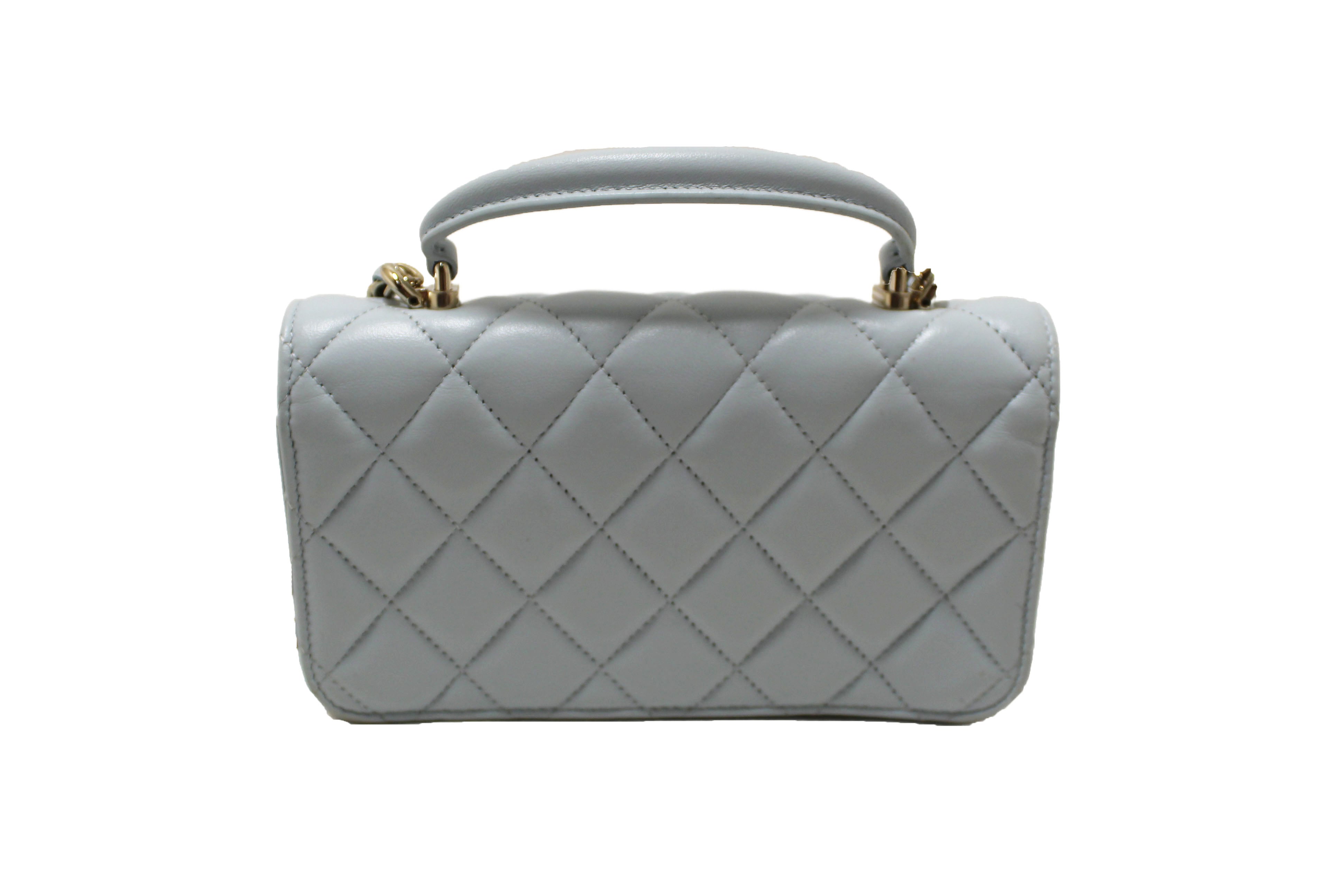 Authentic Chanel Light Blue Quilted Lambskin Leather Flap Phone Holder with Chain Crossbody Bag