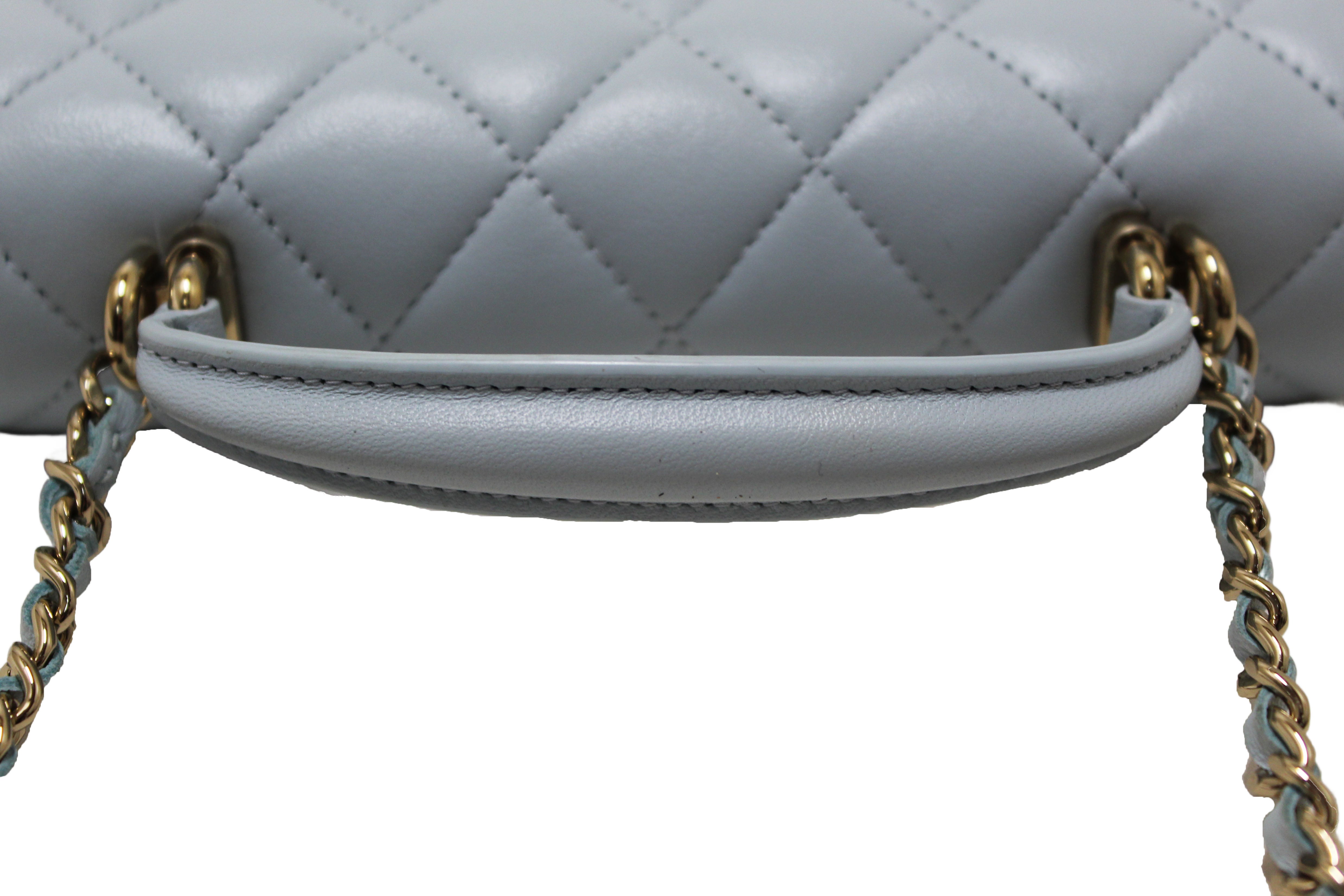 Authentic Chanel Light Blue Quilted Lambskin Leather Flap Phone Holder with Chain Crossbody Bag