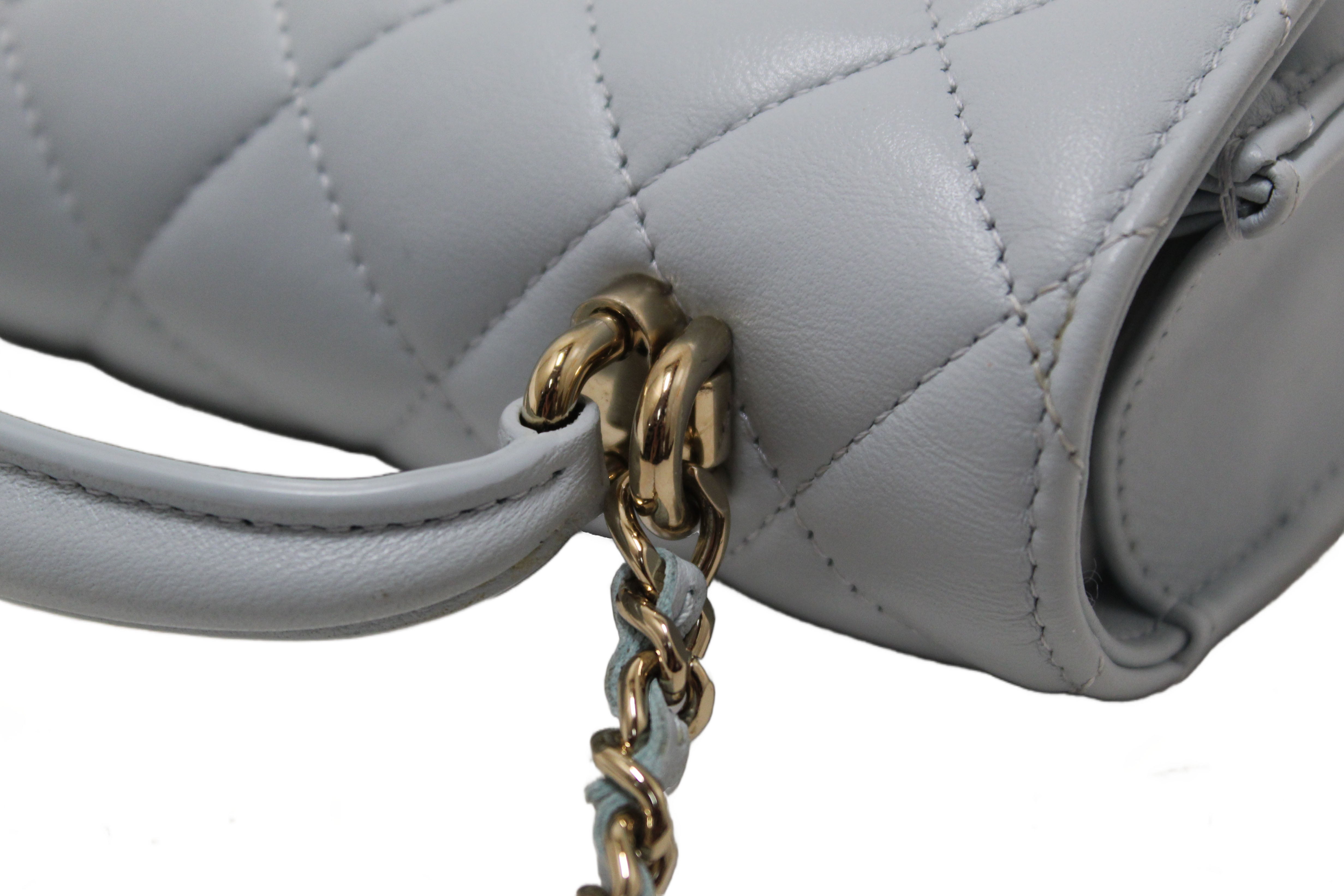 Authentic Chanel Light Blue Quilted Lambskin Leather Flap Phone Holder with Chain Crossbody Bag