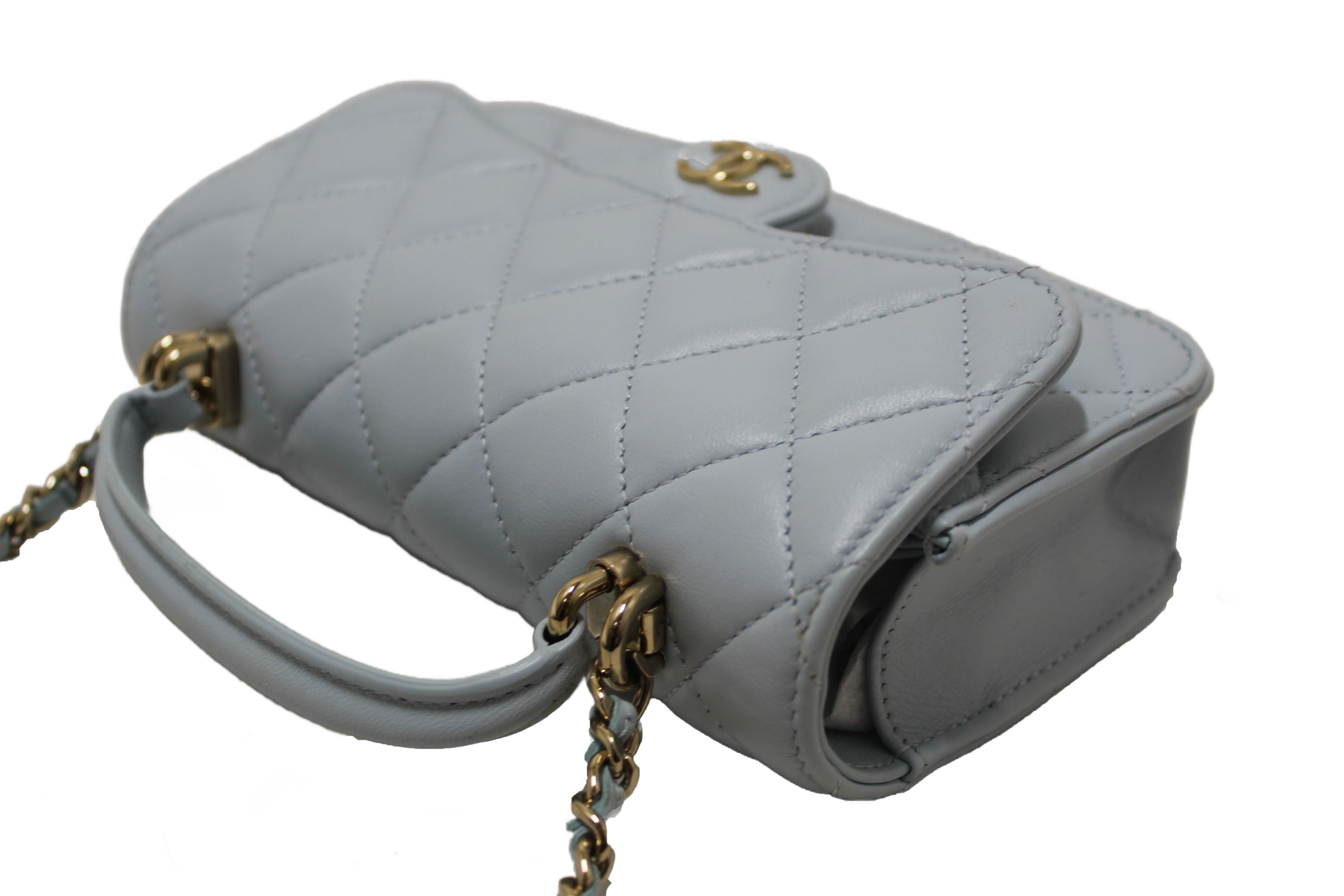 Authentic Chanel Light Blue Quilted Lambskin Leather Flap Phone Holder with Chain Crossbody Bag