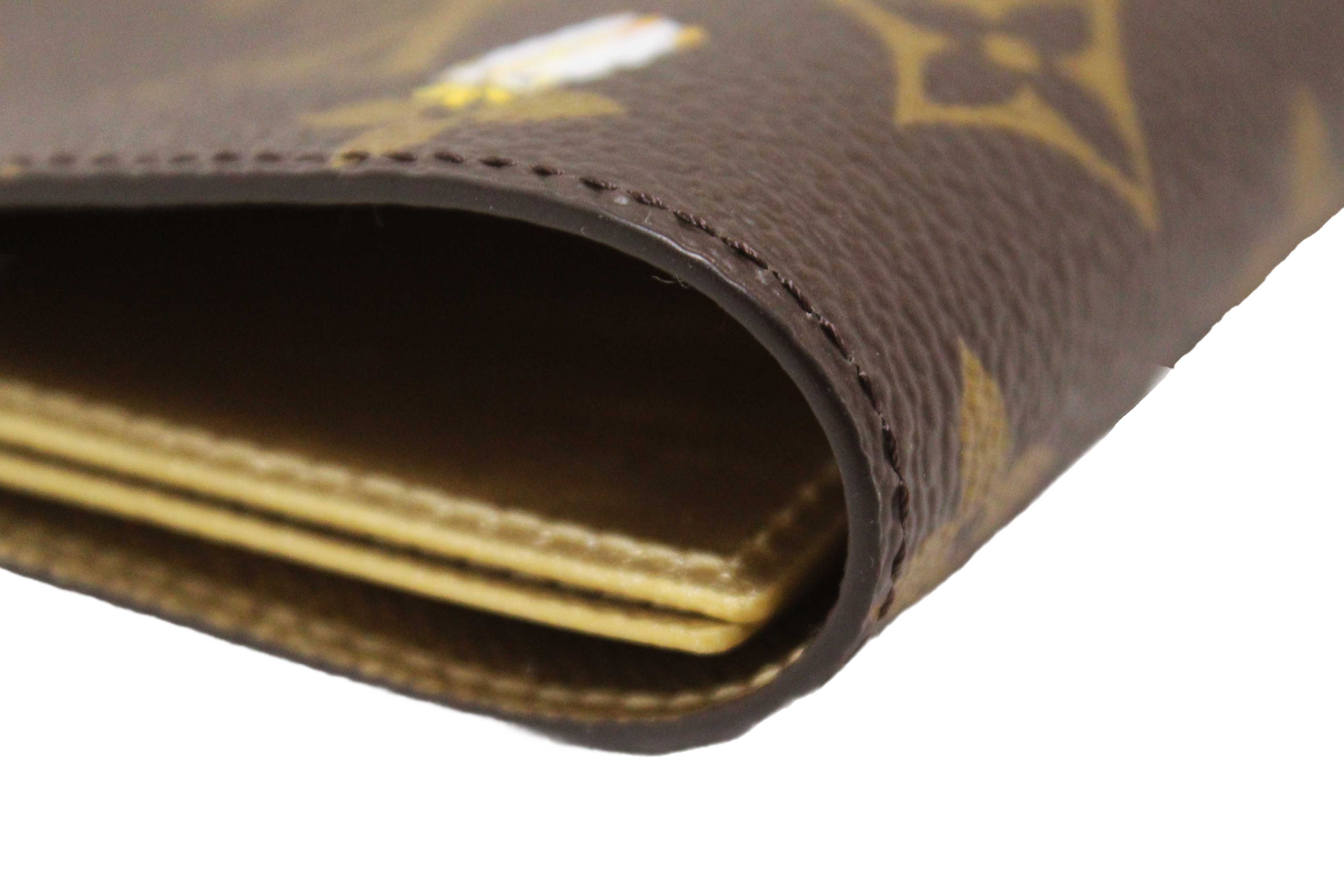 Authentic NEW Louis Vuitton Classic Monogram with  Vivienne Winter Holiday Collection Passport Cover