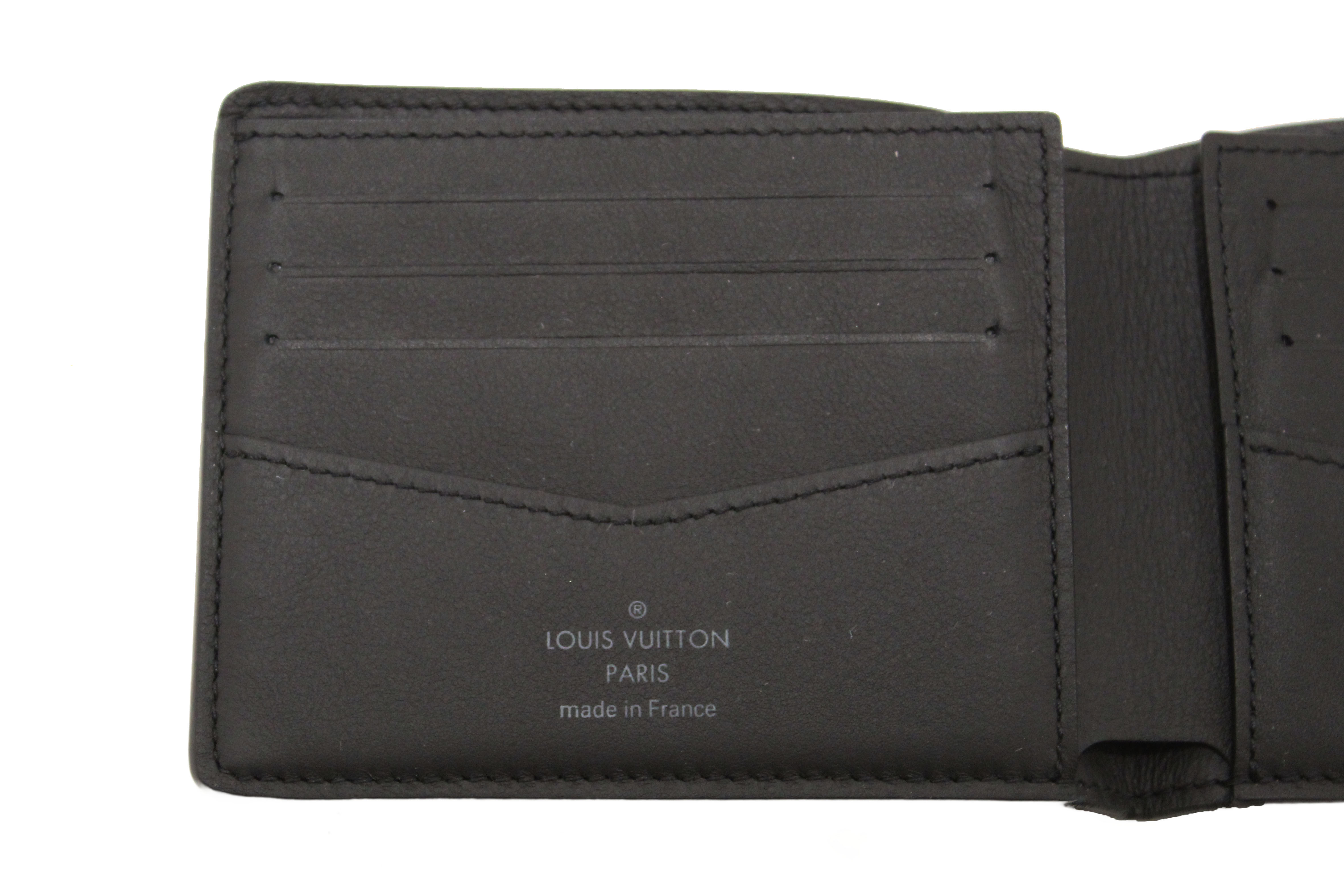 Authentic Louis Vuitton Black Cowhide Faded Monogram Slender Men Wallet