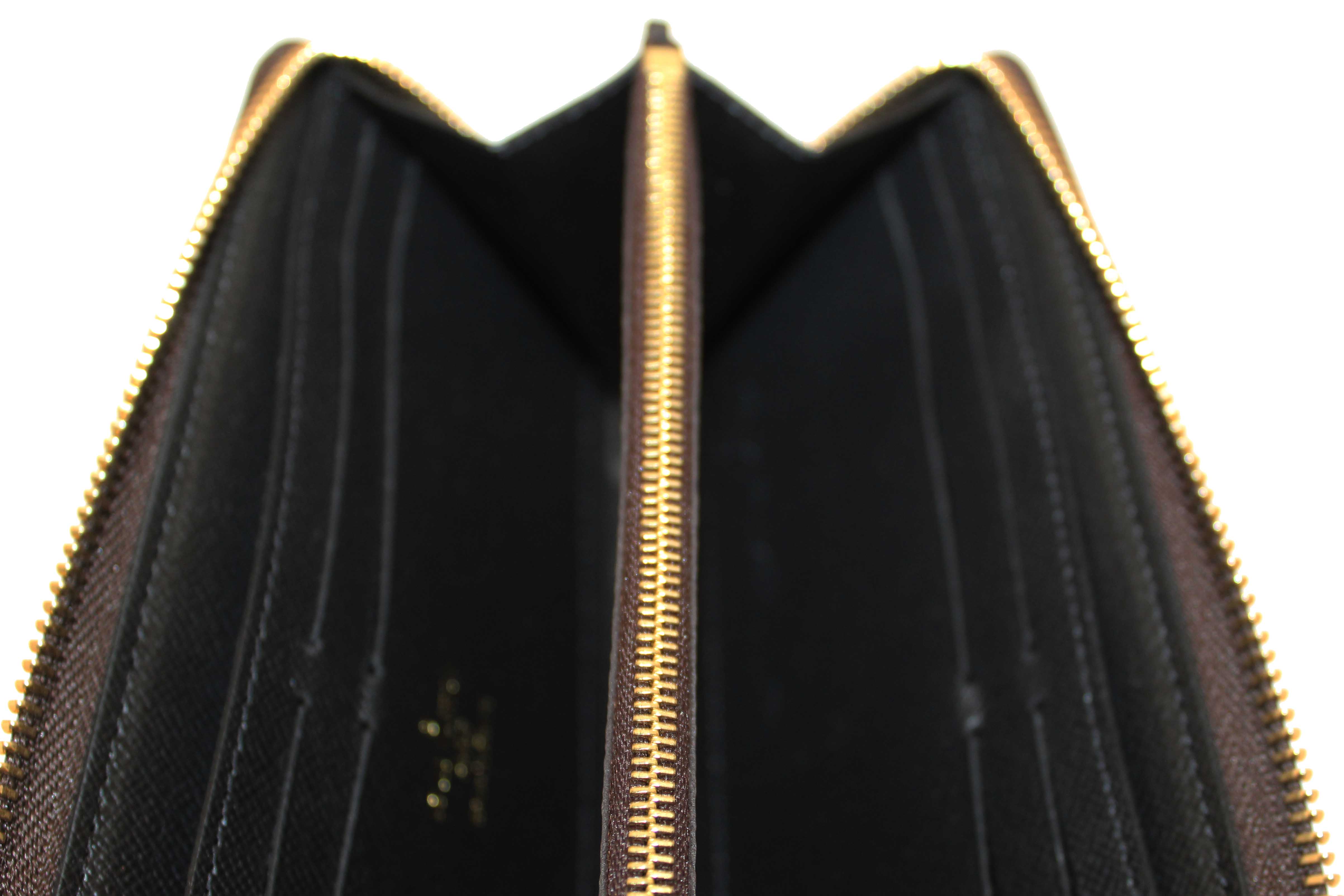 Authentic Louis Vuitton Monogram Reverse Canvas Clemence Wallet
