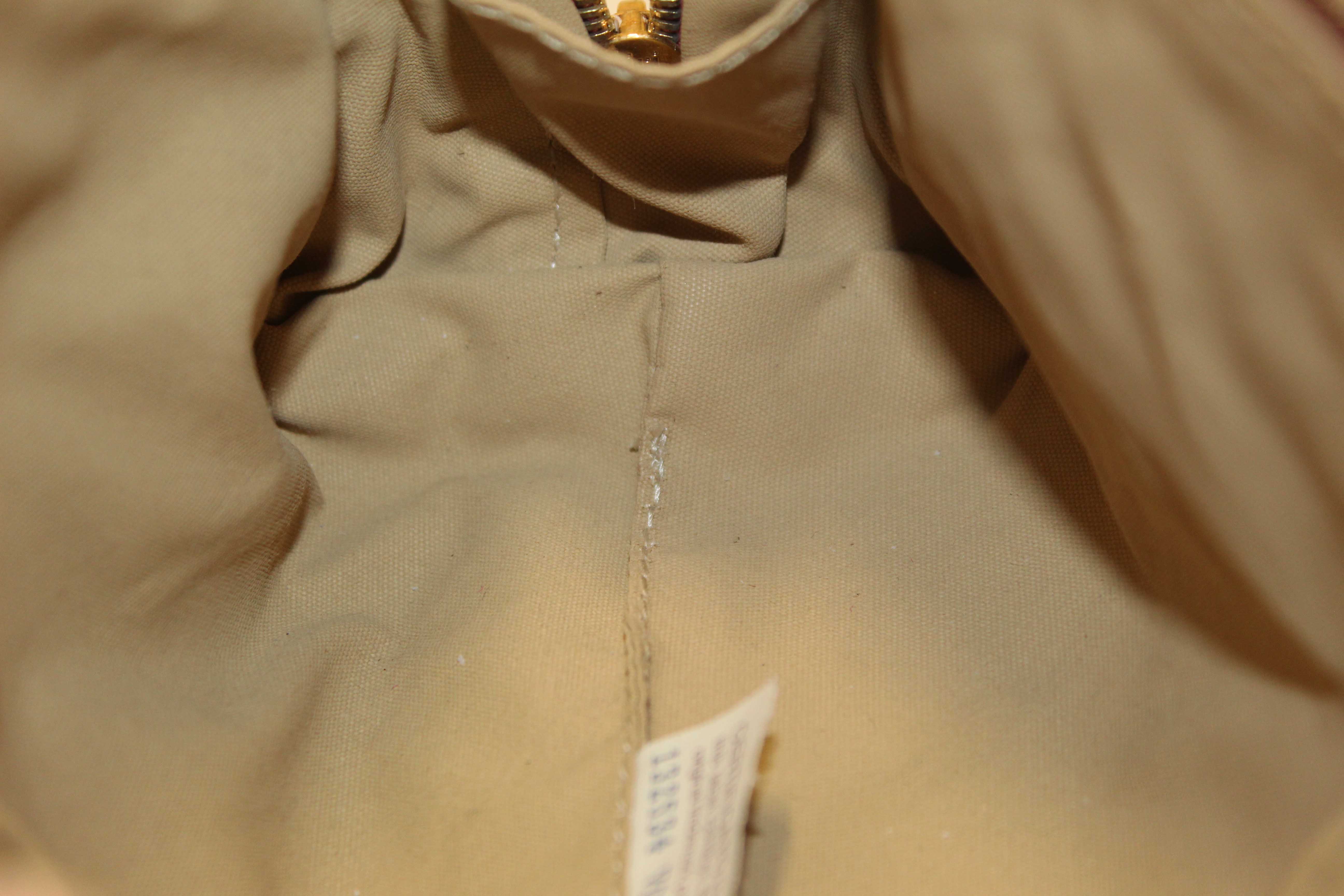 Authentic Bottega Veneta Dusty Pink Intreciciato Leather Cosmetic Pouch