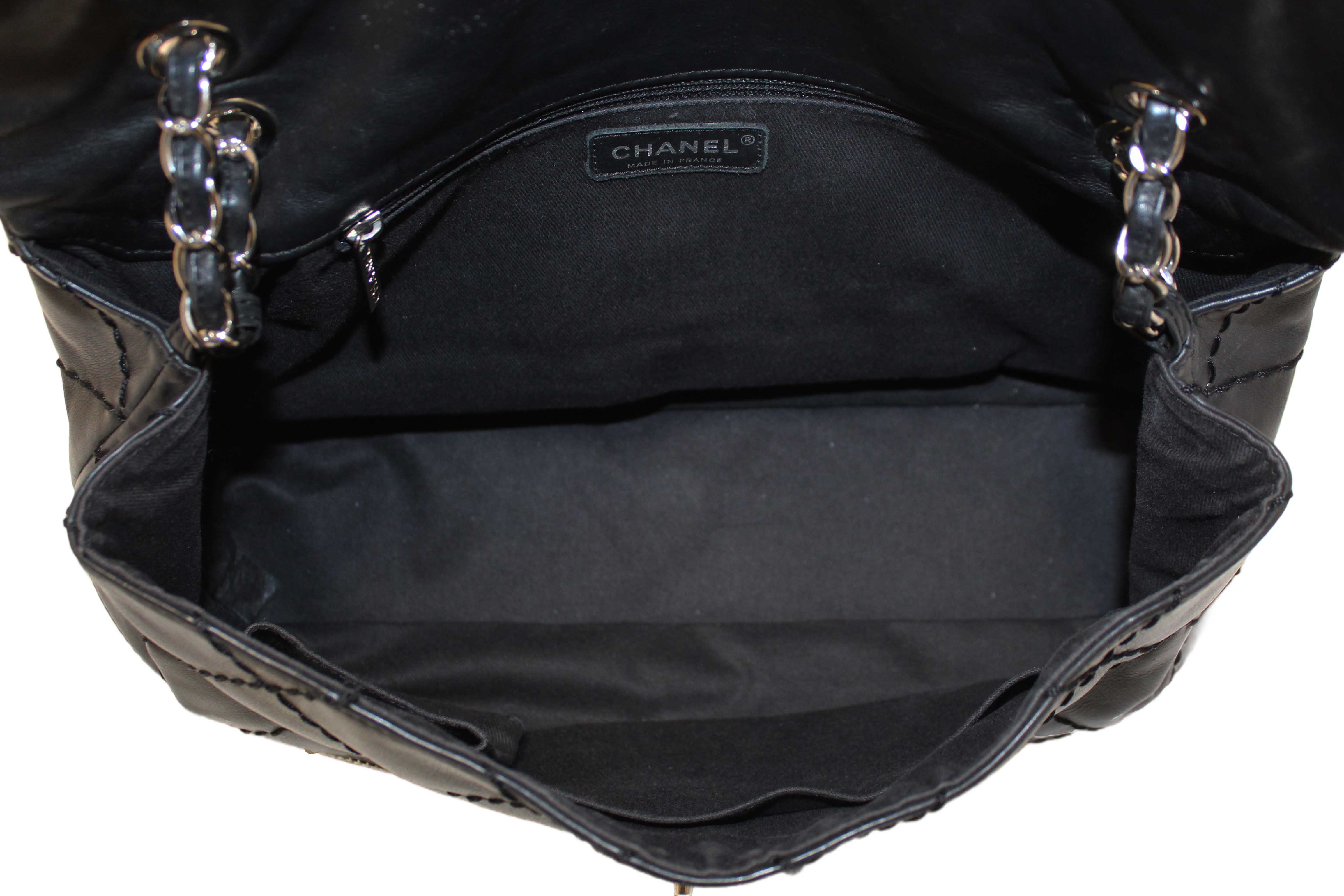 Authentic Chanel Black Quilted Calfskin Leather Expandable Ligne Flap Bag