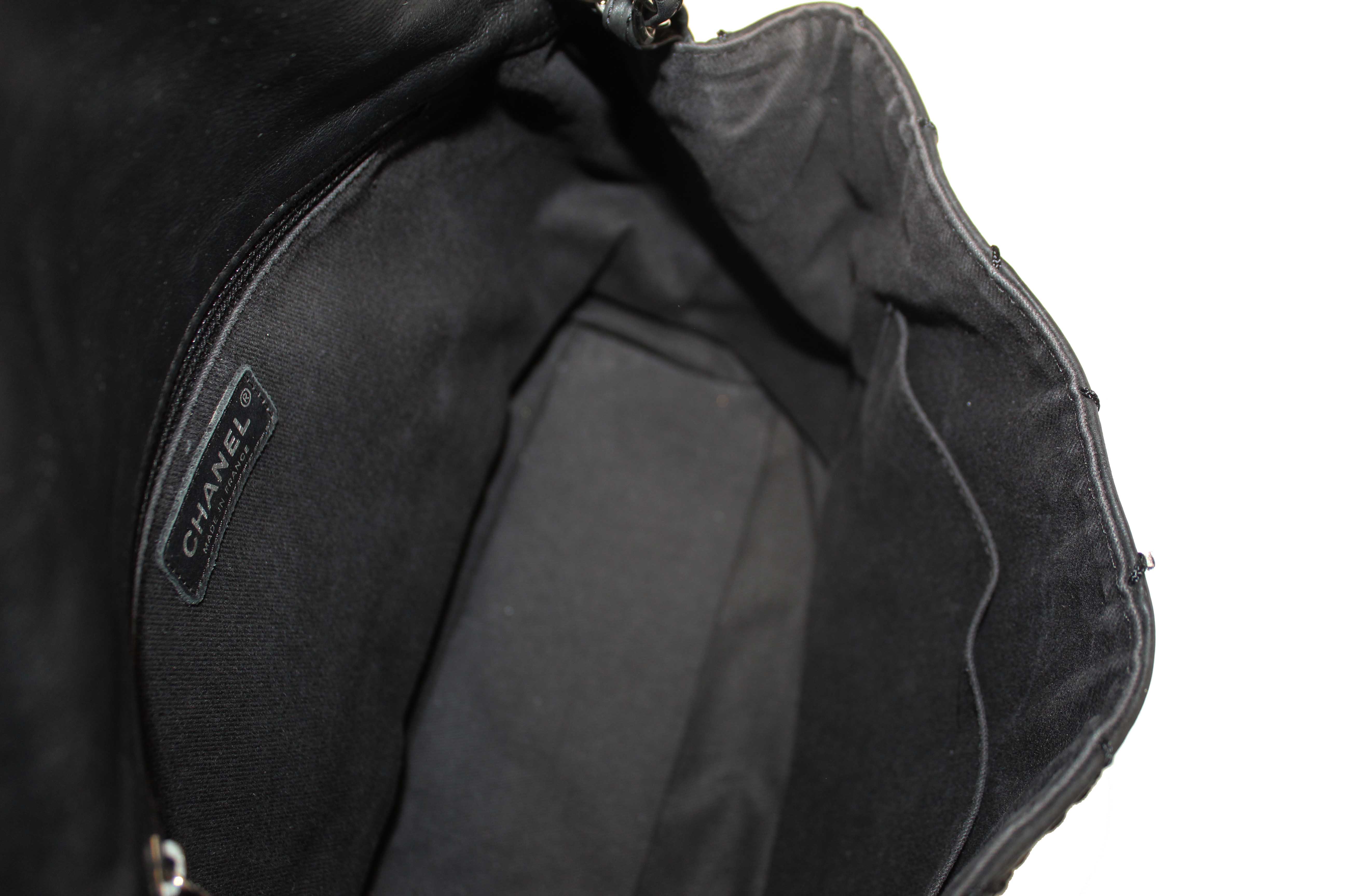 Authentic Chanel Black Quilted Calfskin Leather Expandable Ligne Flap Bag