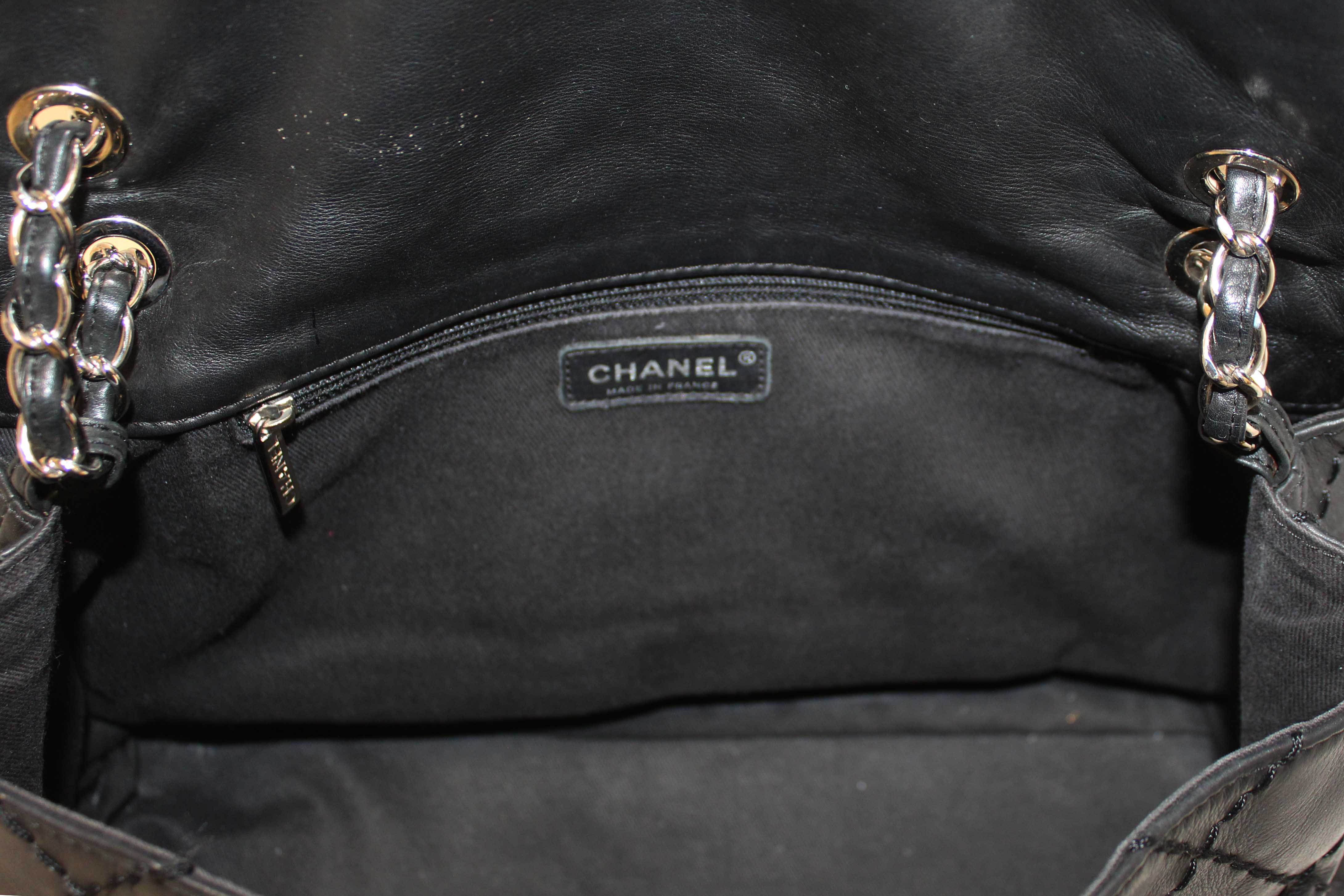 Authentic Chanel Black Quilted Calfskin Leather Expandable Ligne Flap Bag