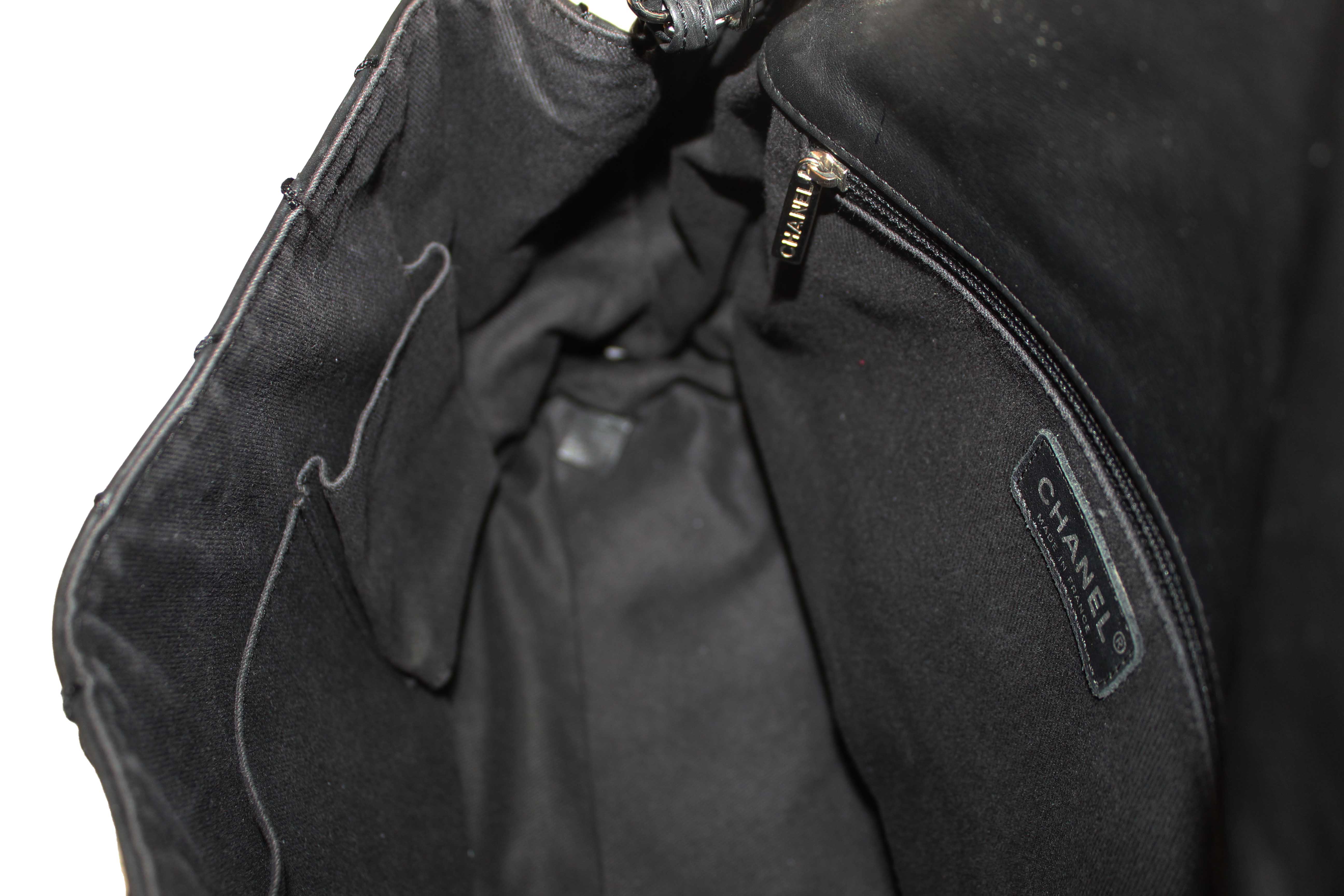 Authentic Chanel Black Quilted Calfskin Leather Expandable Ligne Flap Bag