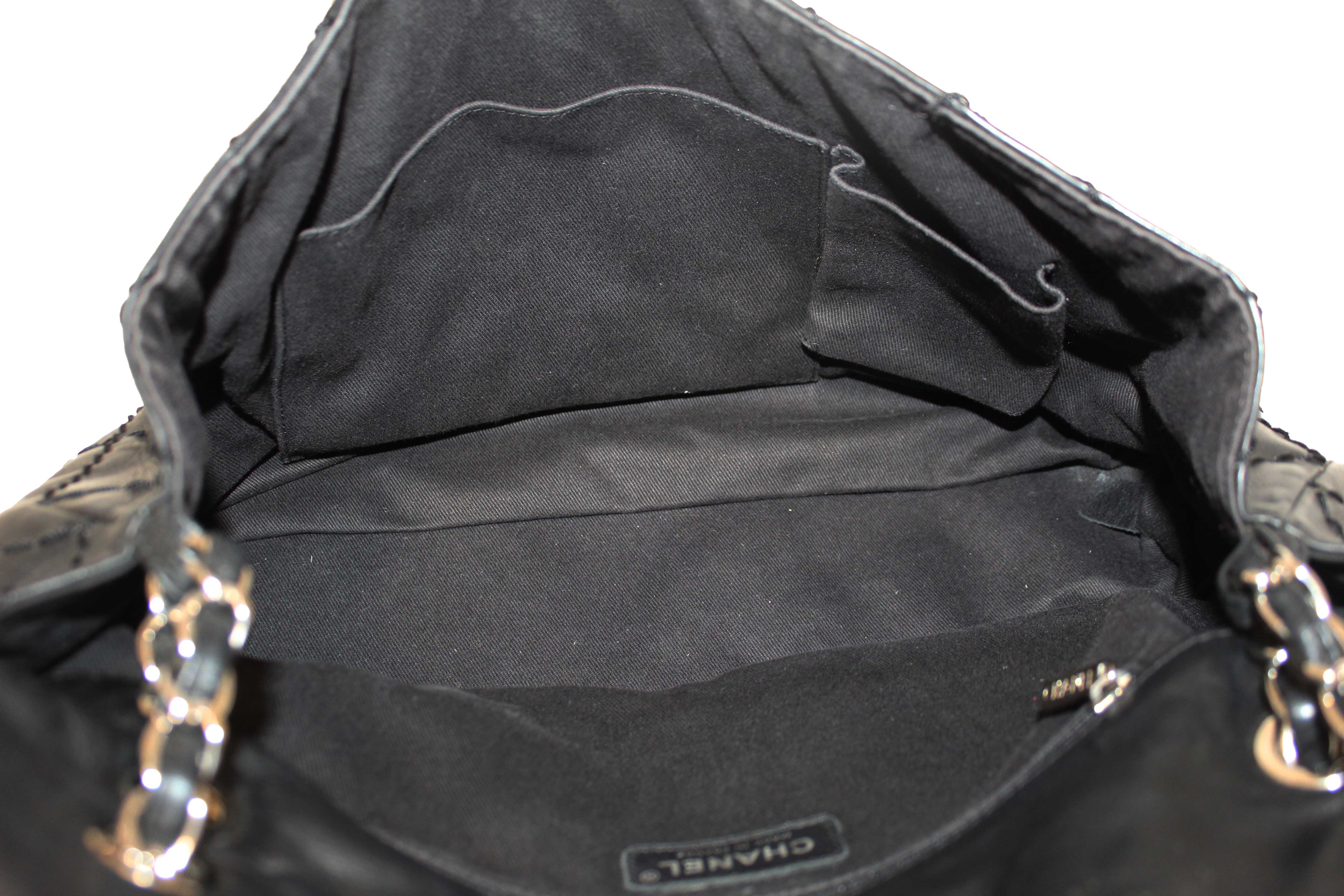 Authentic Chanel Black Quilted Calfskin Leather Expandable Ligne Flap Bag