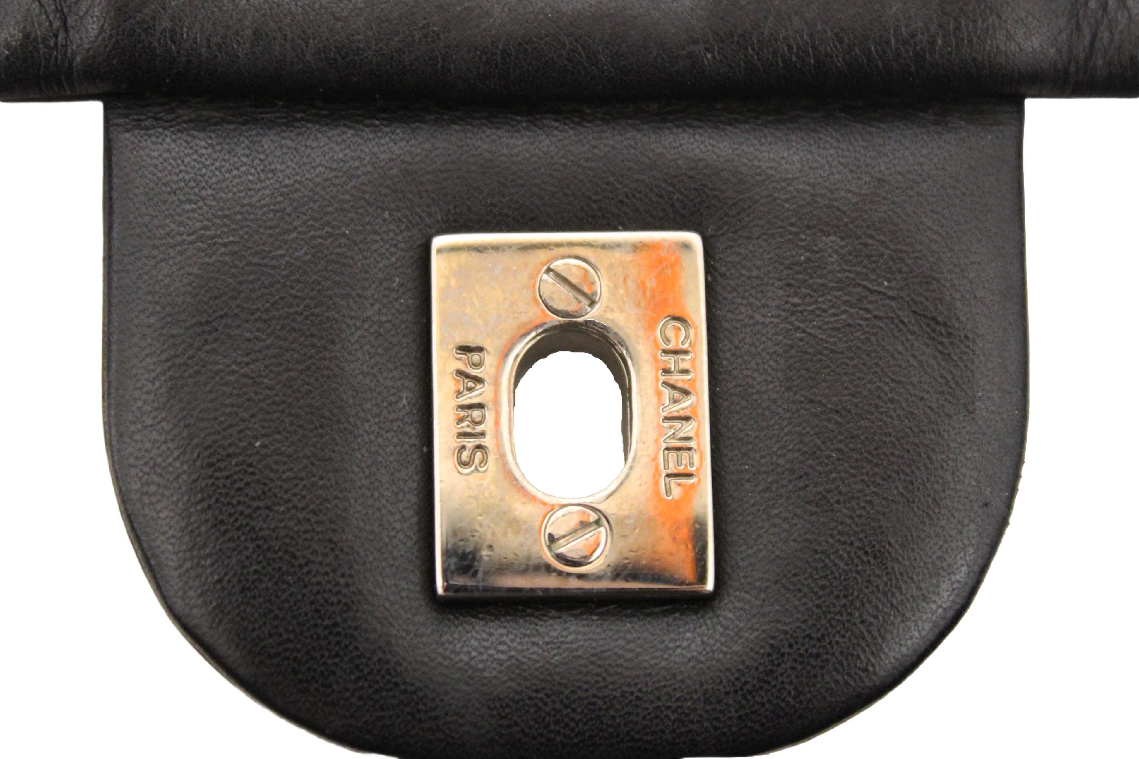 Authentic Chanel Black Quilted Calfskin Leather Expandable Ligne Flap Bag