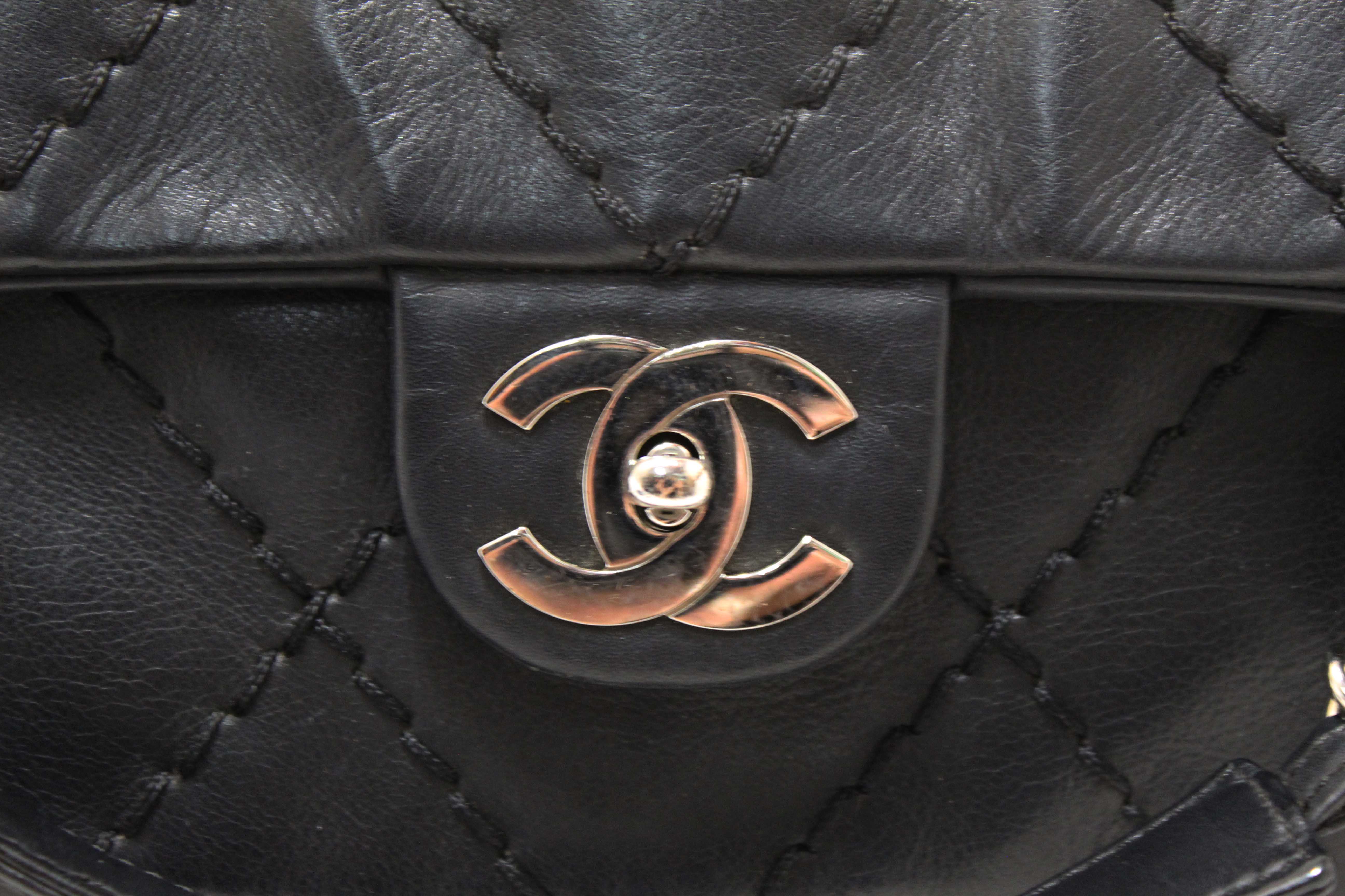Authentic Chanel Black Quilted Calfskin Leather Expandable Ligne Flap Bag