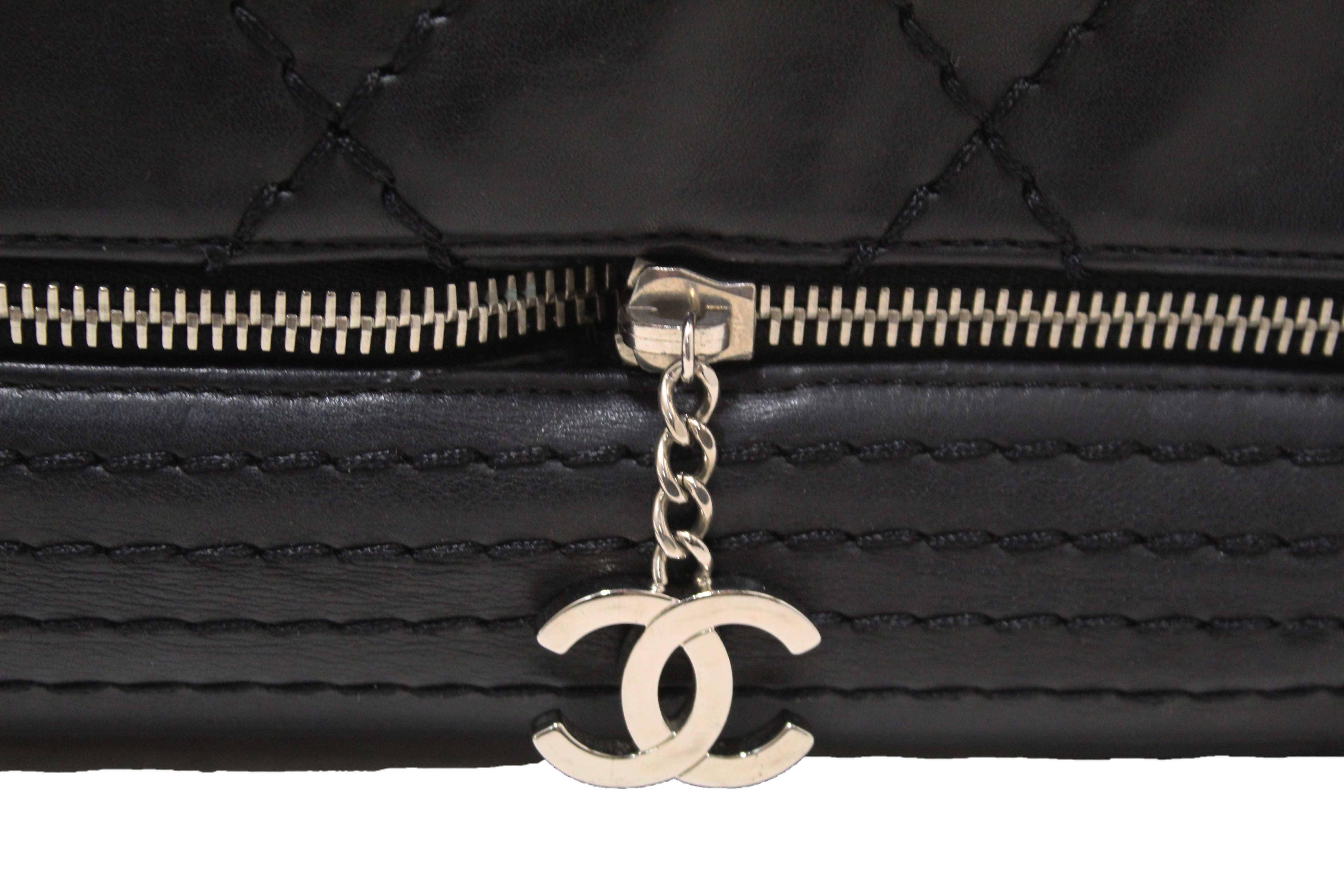 Authentic Chanel Black Quilted Calfskin Leather Expandable Ligne Flap Bag