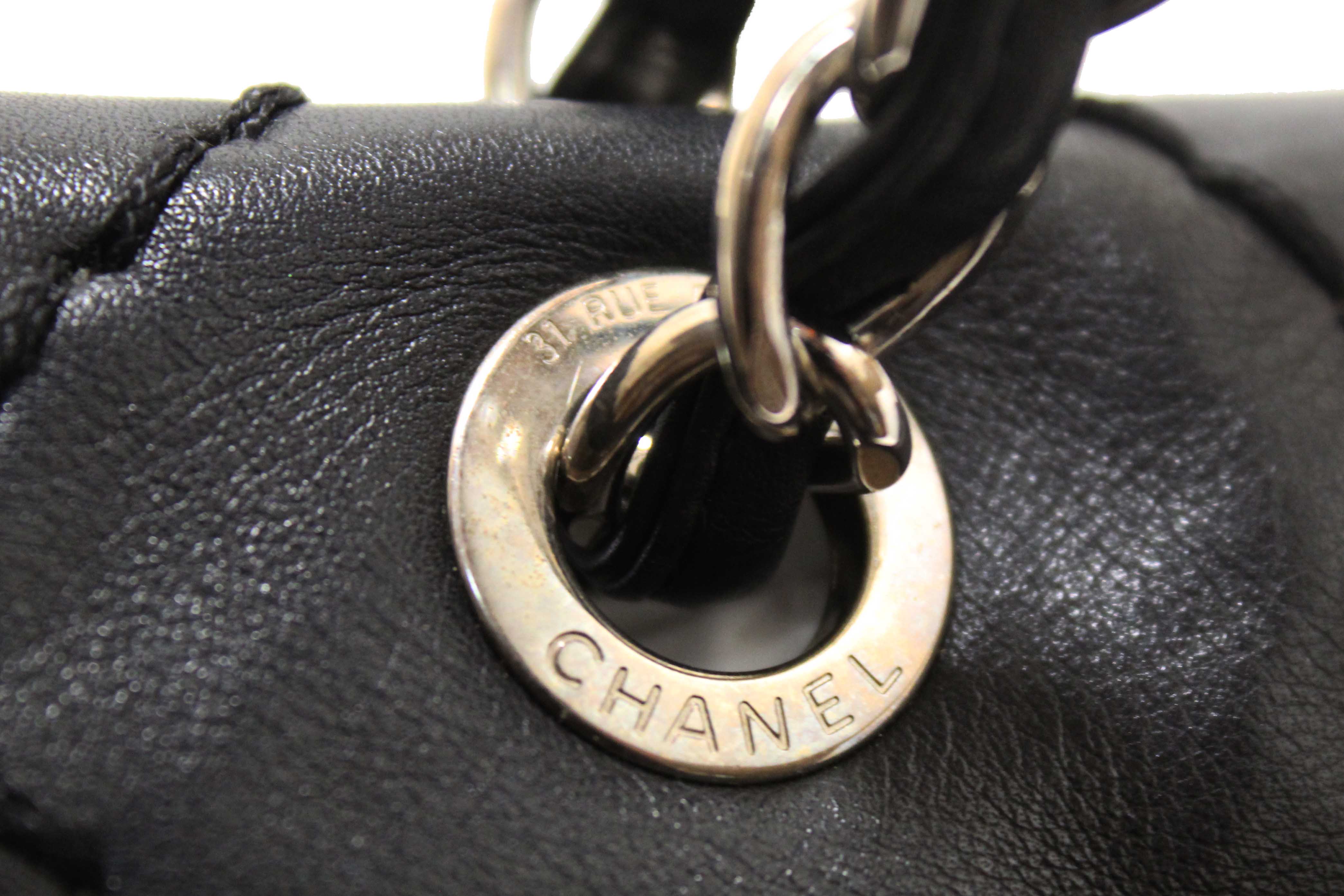 Authentic Chanel Black Quilted Calfskin Leather Expandable Ligne Flap Bag