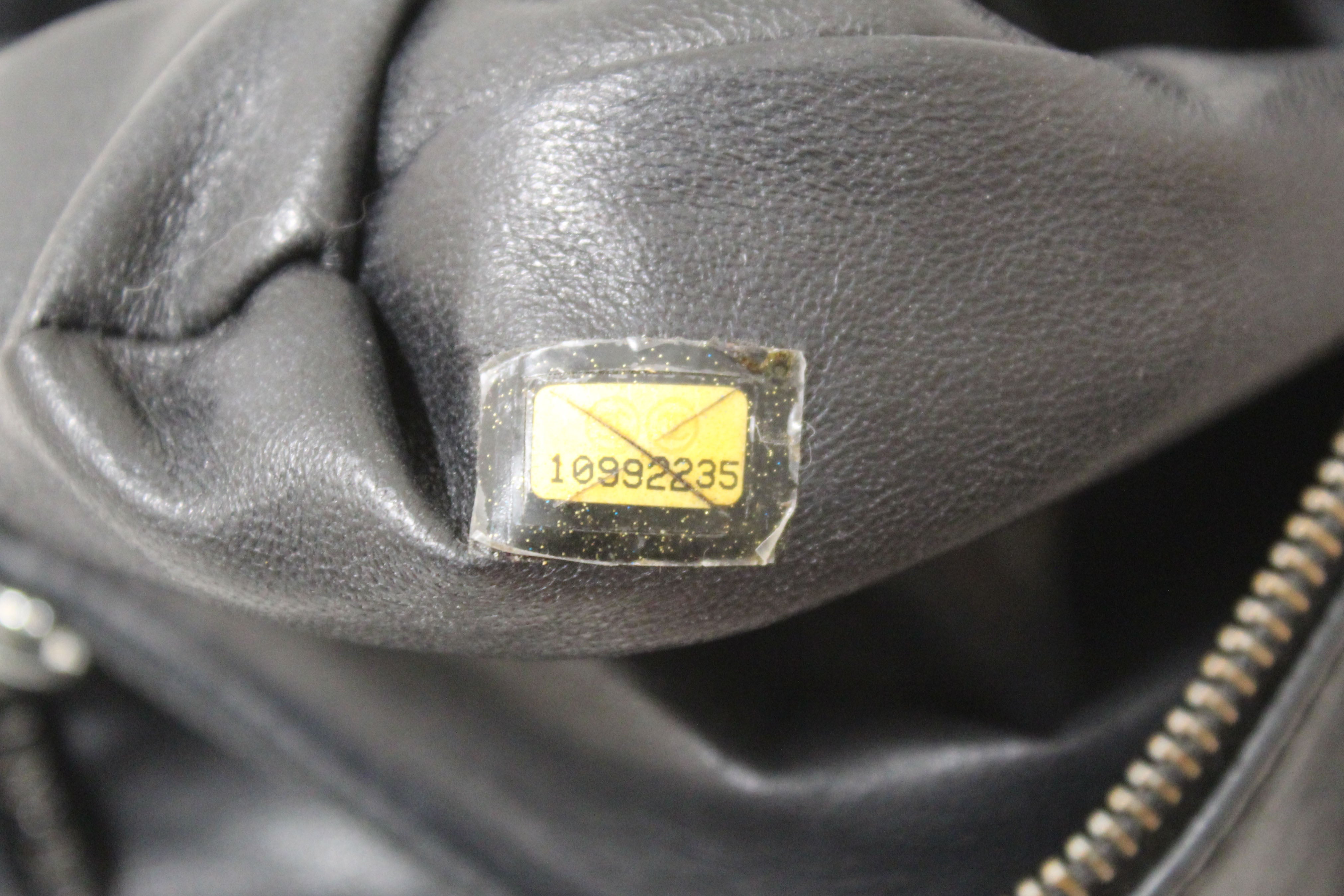 Authentic Chanel Vintage Black Wild Stitch Quilted Calfskin Leather CC Timeless Shoulder Bag