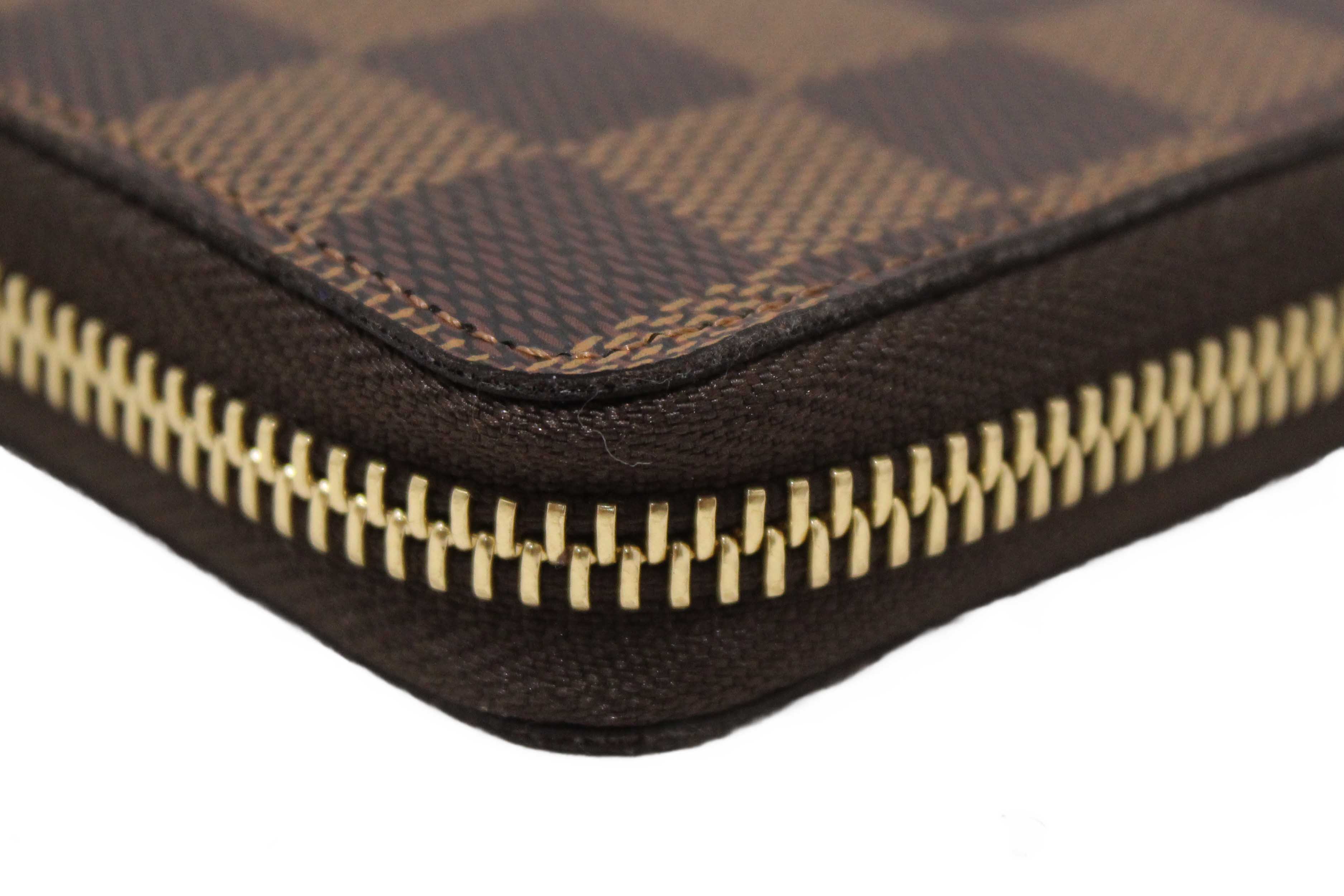 Authentic Louis Vuitton Damier Ebene Canvas Clemence Zippy Wallet