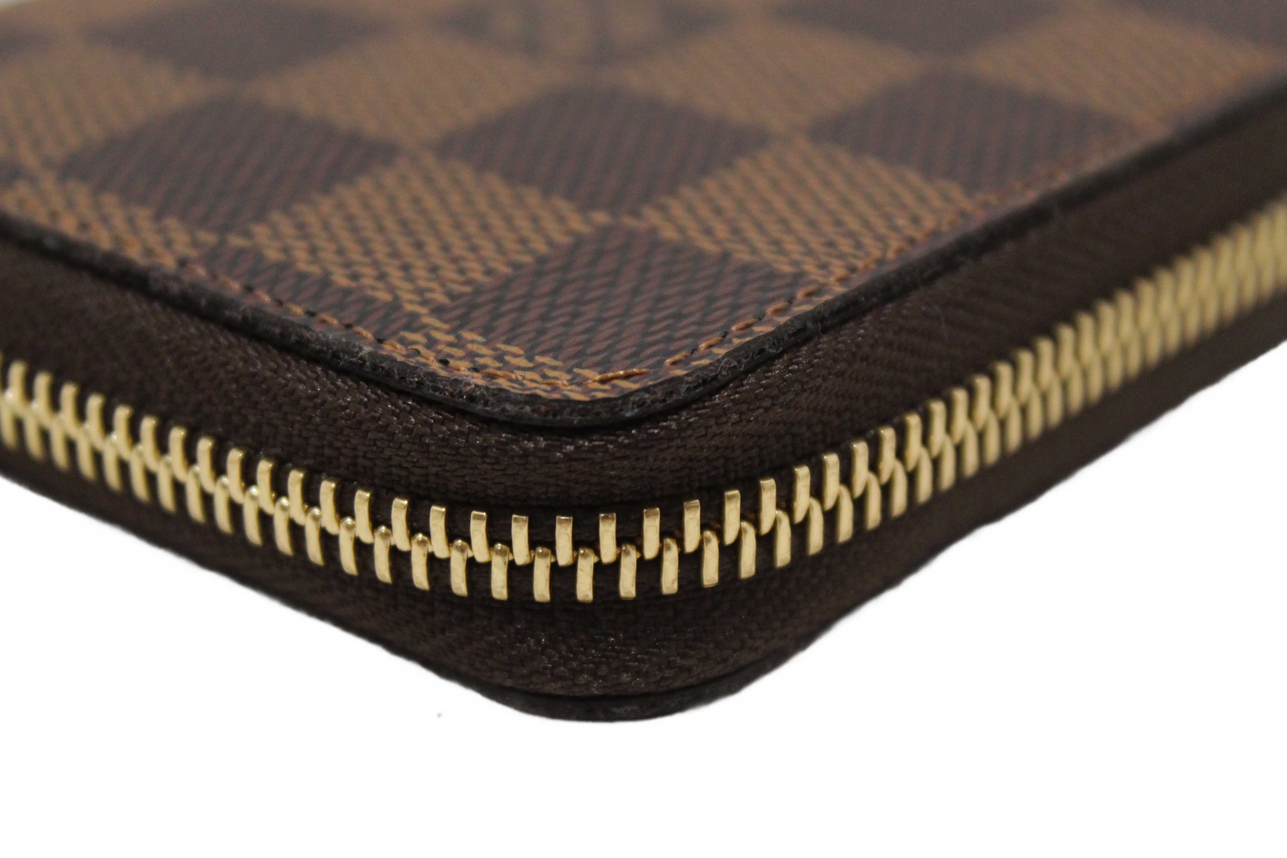 Authentic Louis Vuitton Damier Ebene Canvas Clemence Zippy Wallet