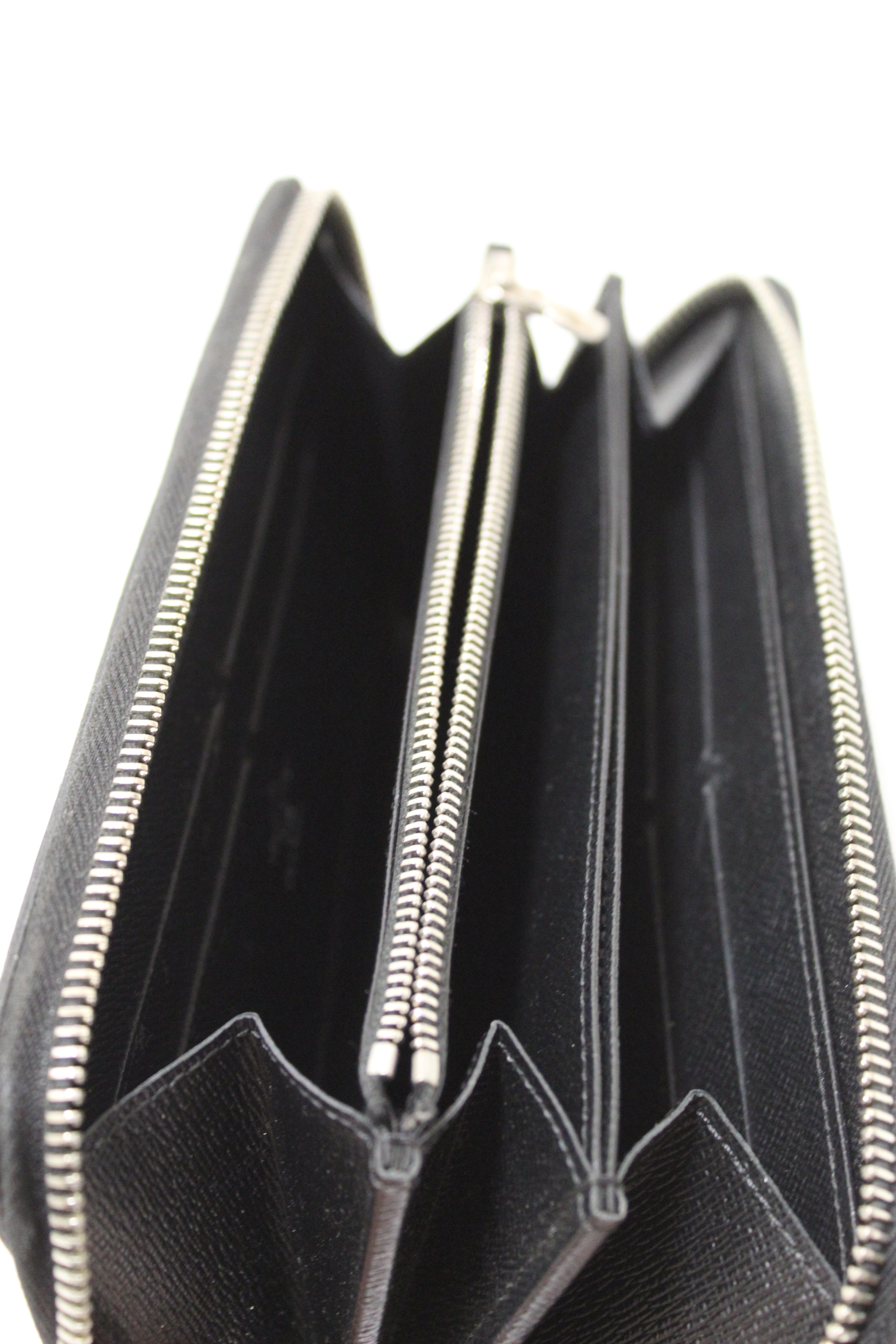 Authentic Louis Vuitton Black Electric Epi Leather Zippy Wallet – Paris ...