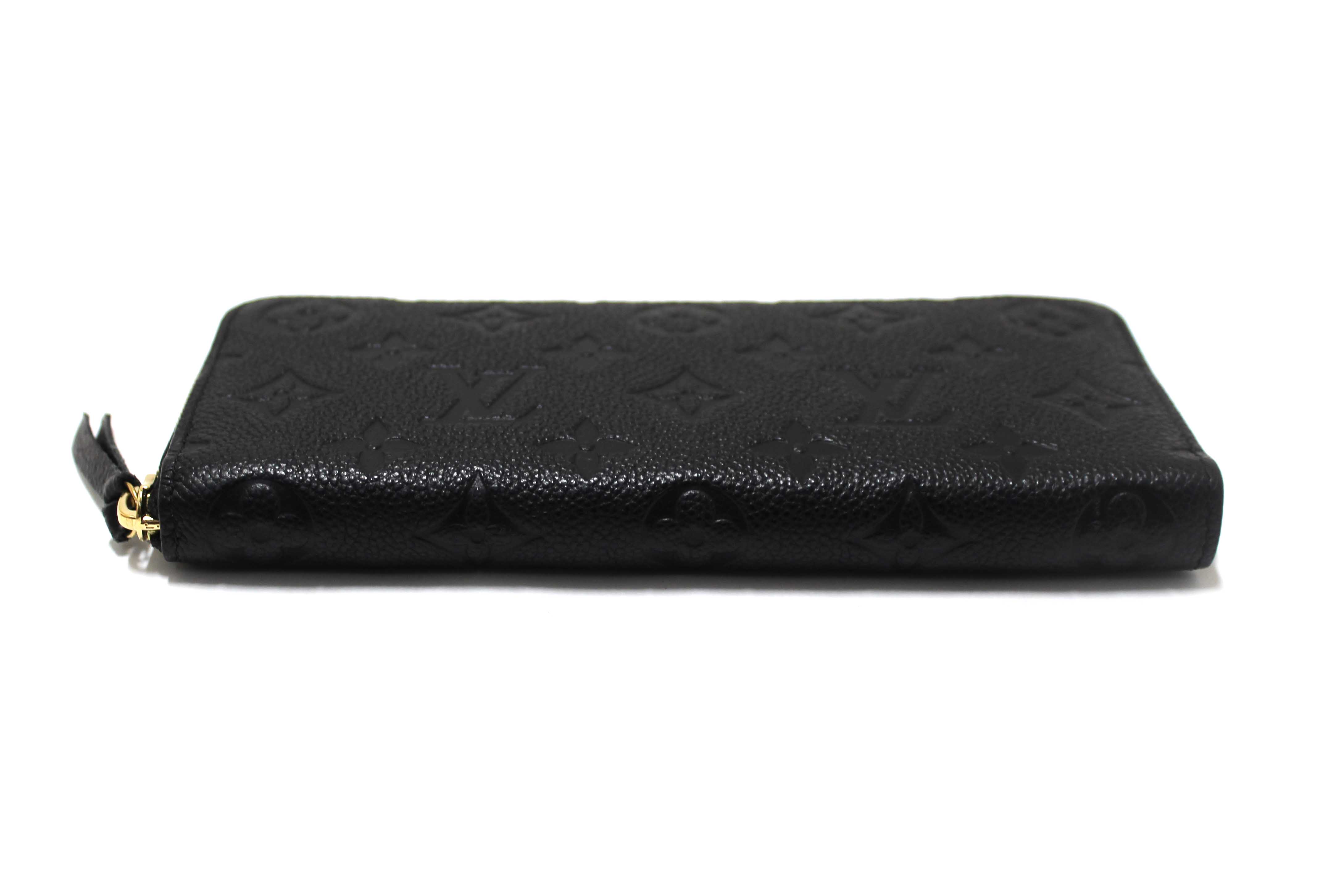 Authentic Louis Vuitton Black Empreinte Leather Clemence Wallet