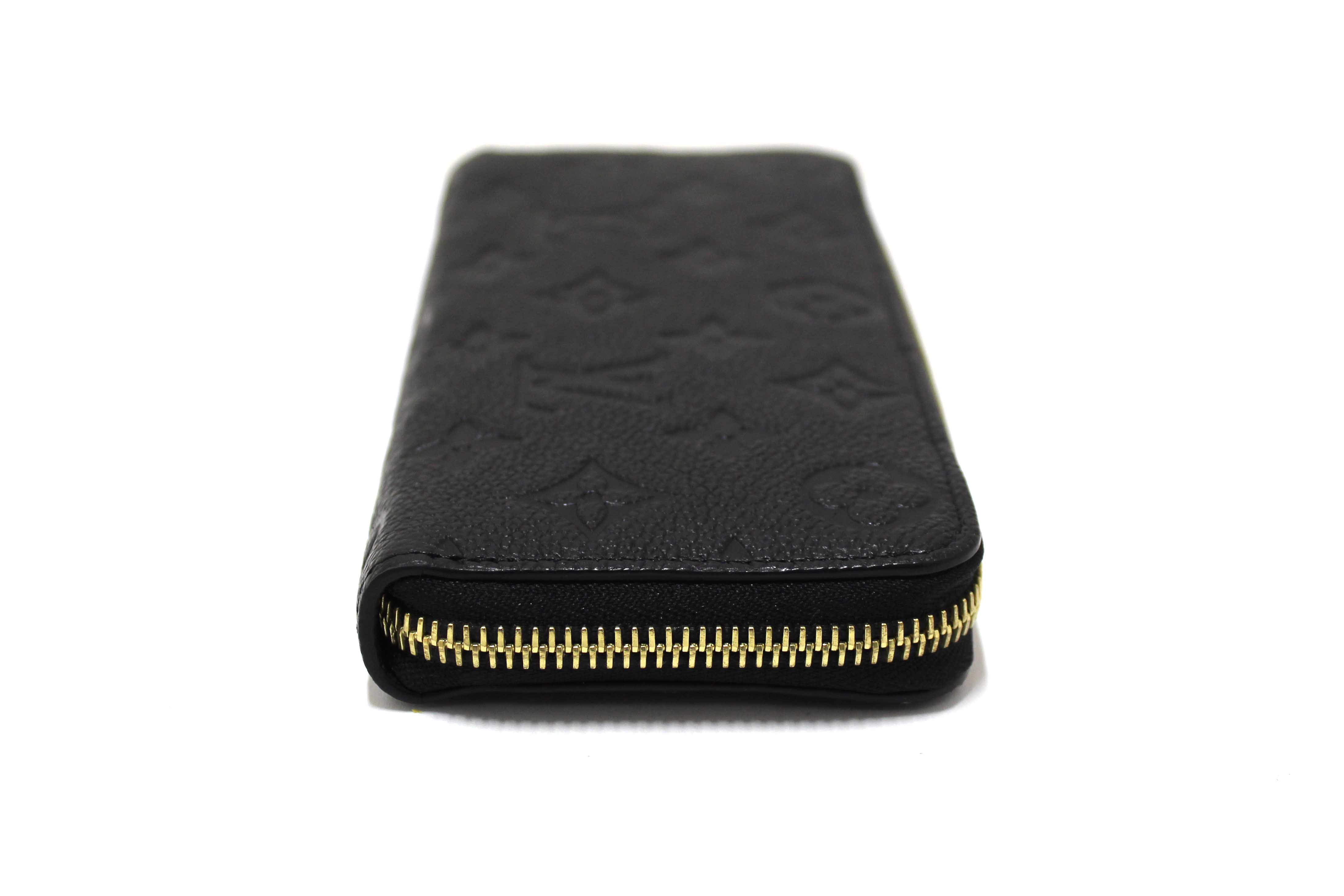 Authentic Louis Vuitton Black Empreinte Leather Clemence Wallet