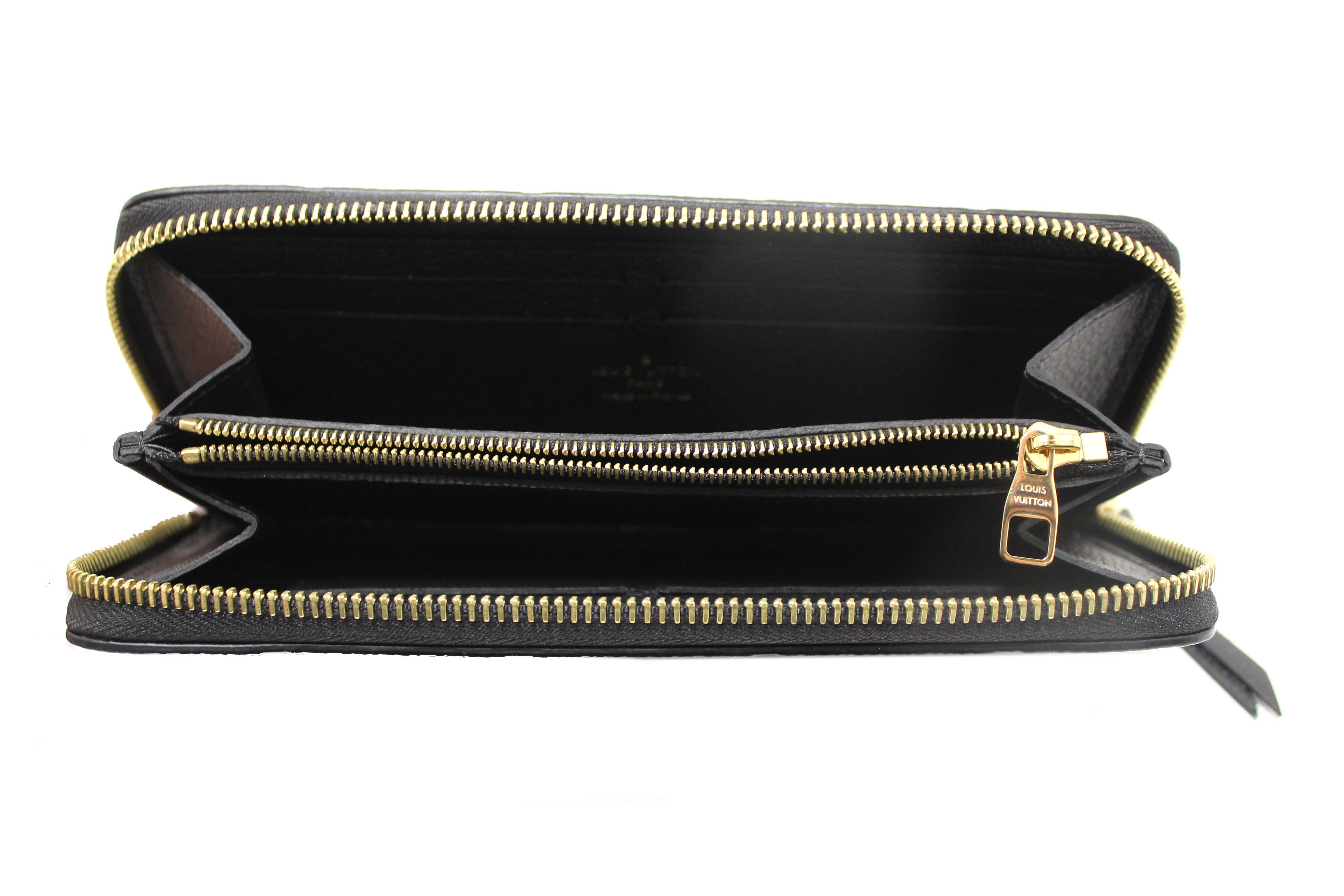 Authentic Louis Vuitton Black Empreinte Leather Clemence Wallet