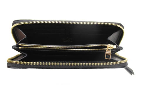 Authentic Louis Vuitton Black Empreinte Leather Clemence Wallet