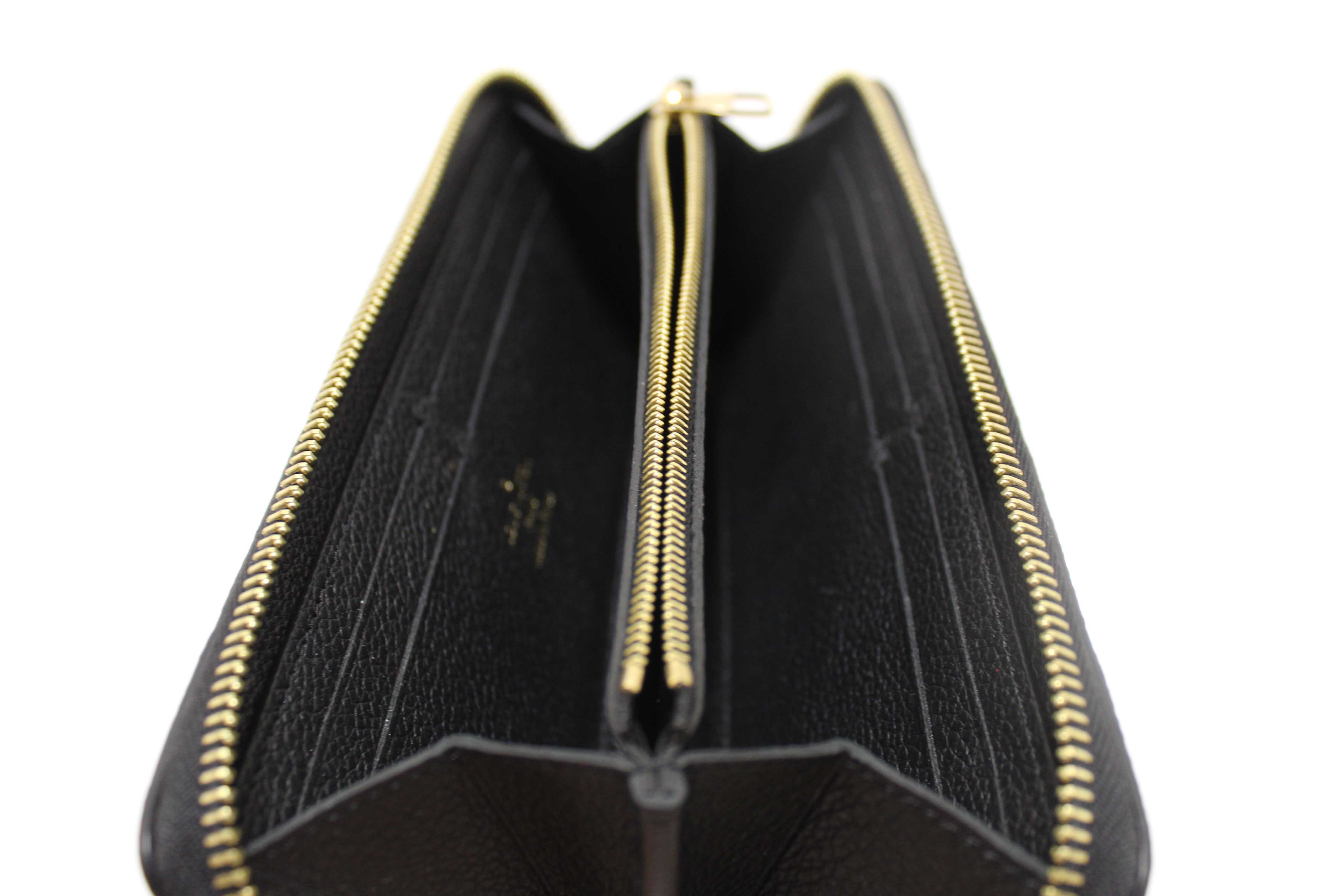 Authentic Louis Vuitton Black Empreinte Leather Clemence Wallet