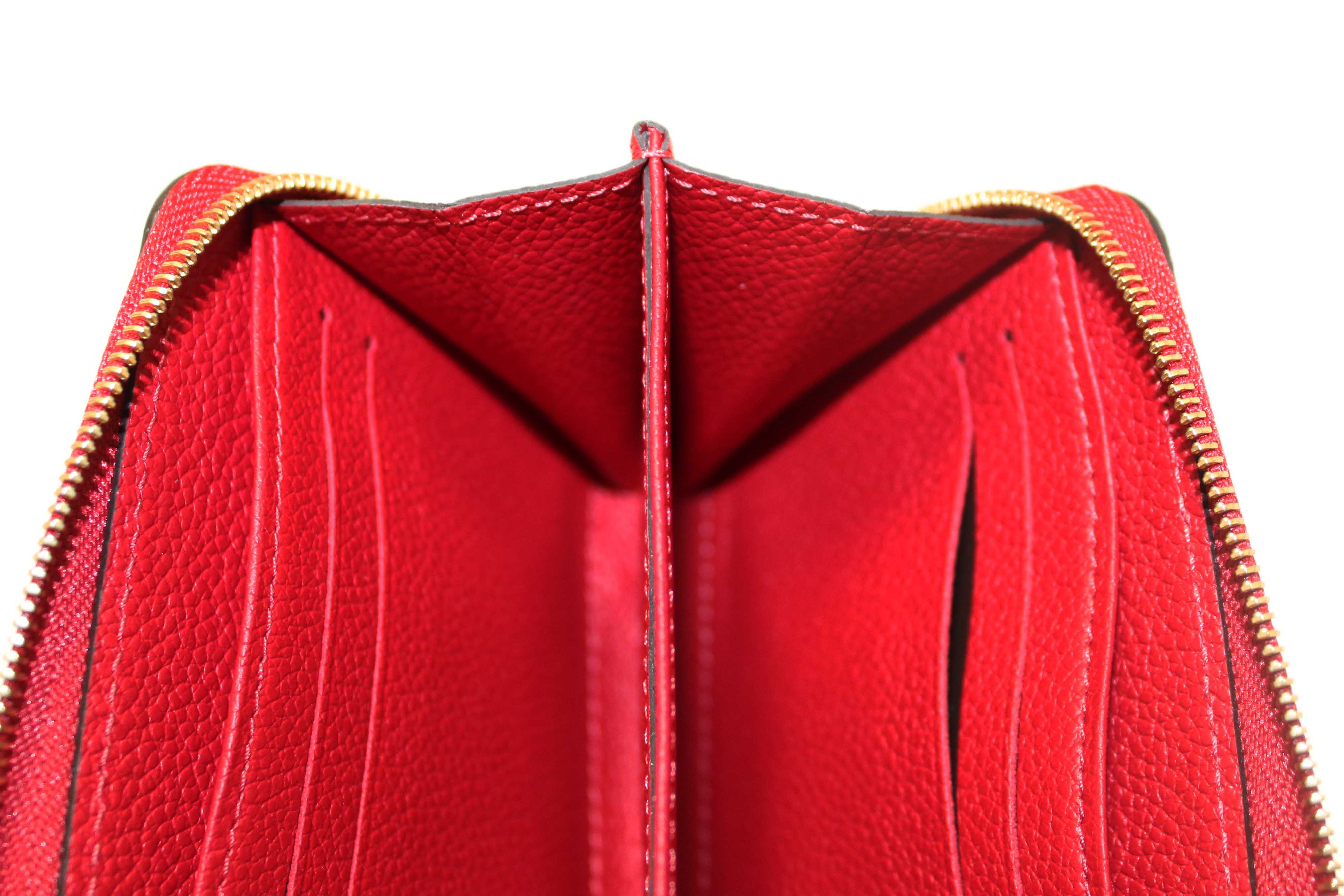 Authentic Louis Vuitton Red Monogram Empreinte Leather Zippy Coin Purse