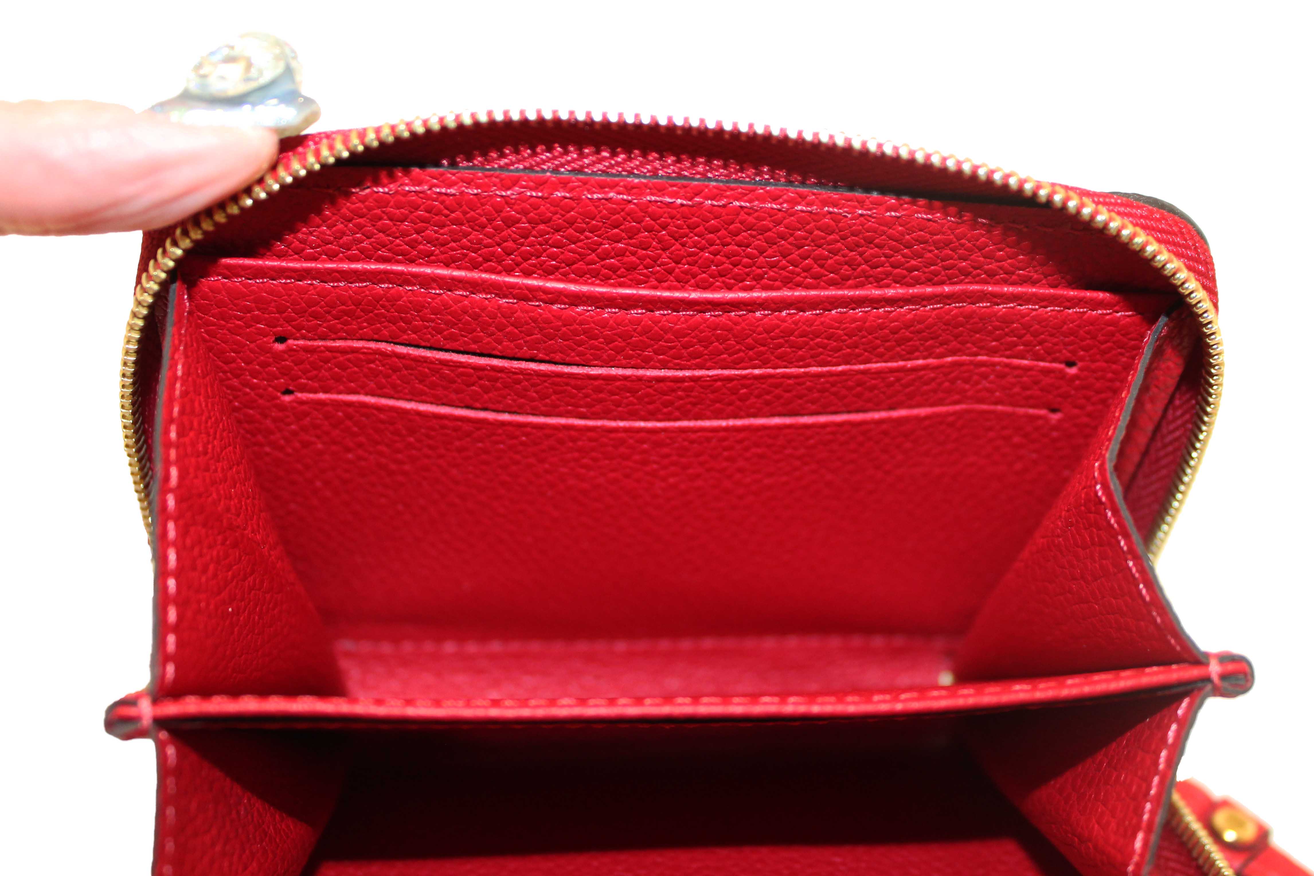 Authentic Louis Vuitton Red Monogram Empreinte Leather Zippy Coin Purse