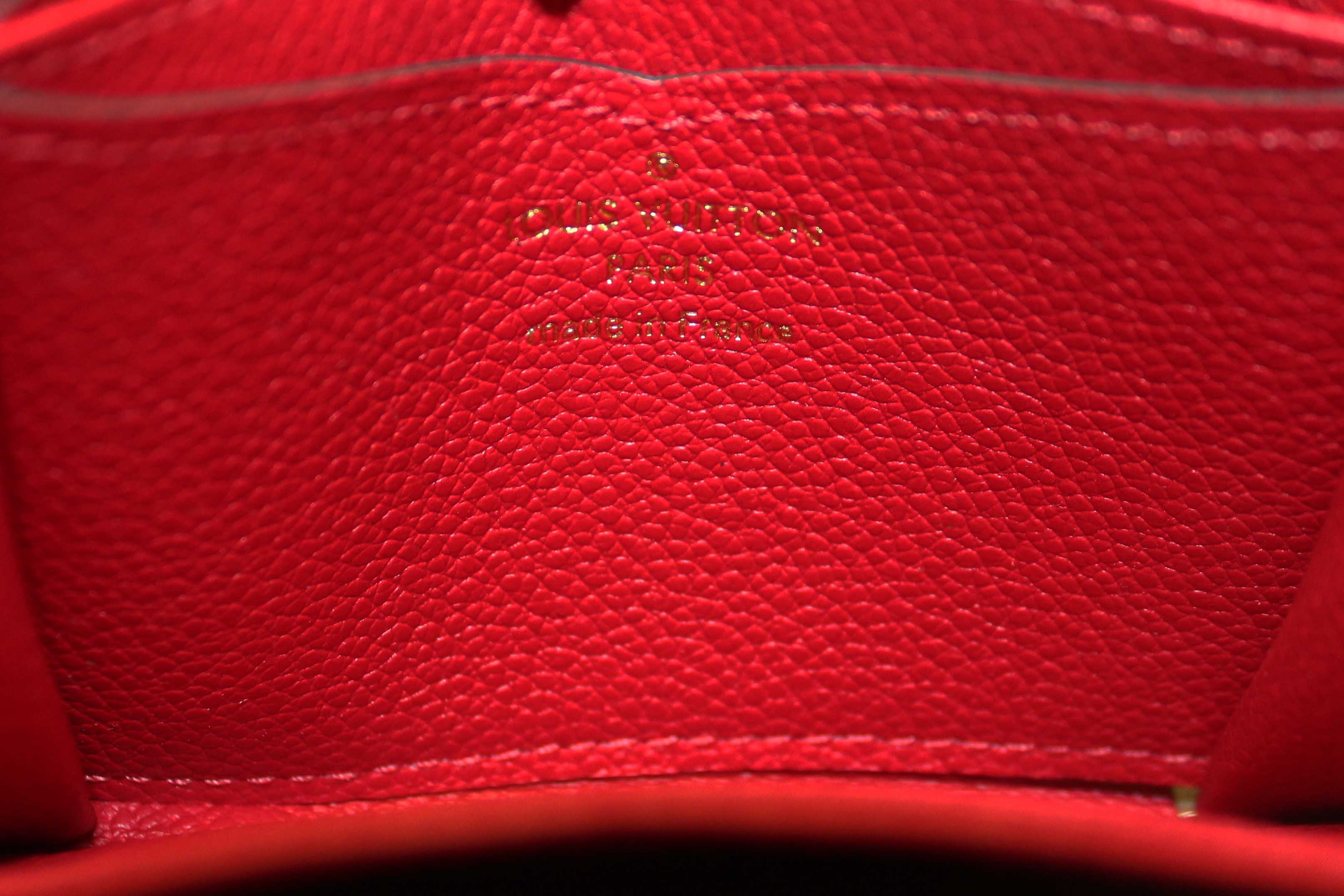 Authentic Louis Vuitton Red Monogram Empreinte Leather Zippy Coin Purse