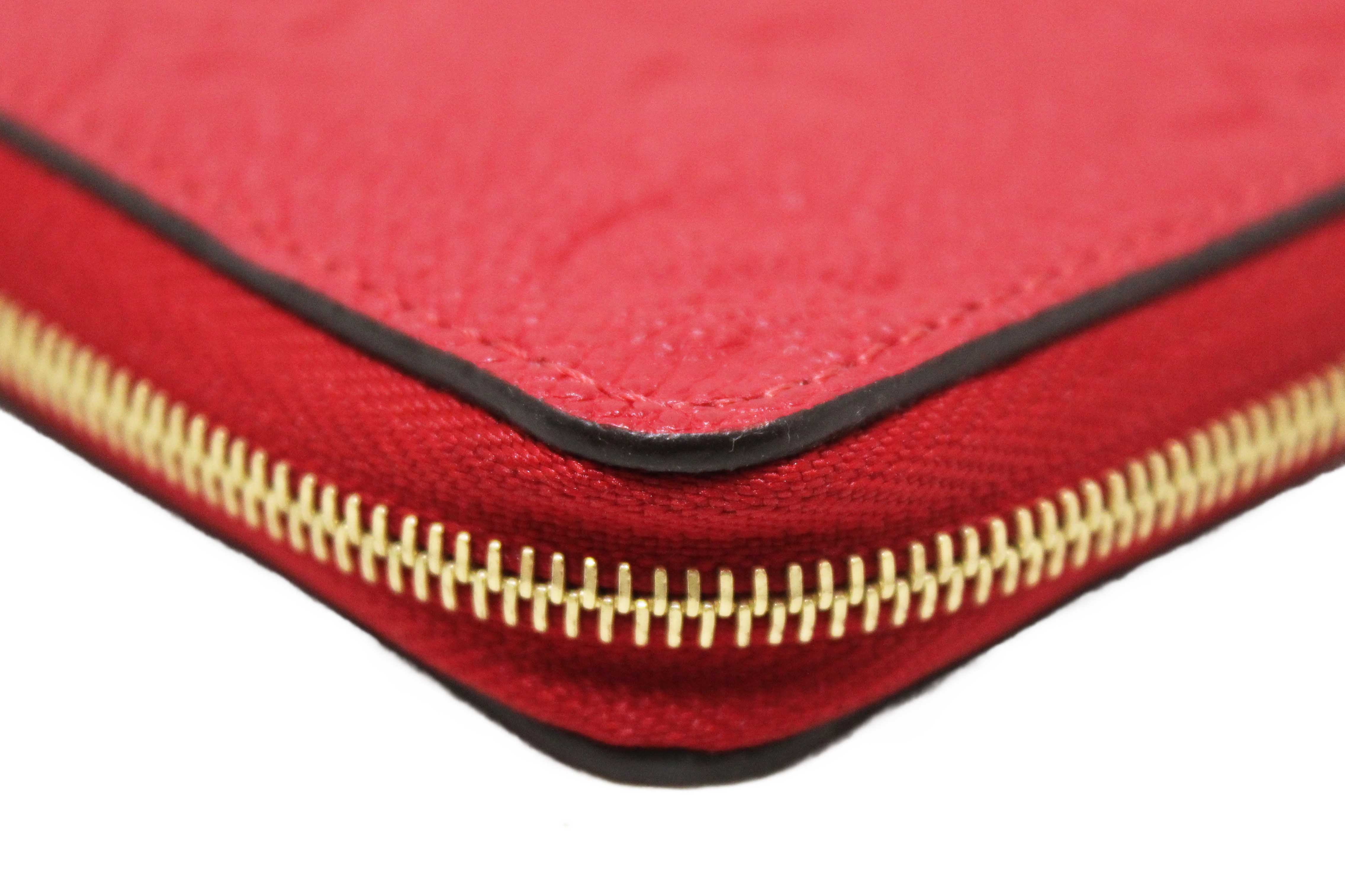 Authentic Louis Vuitton Red Monogram Empreinte Leather Zippy Coin Purse