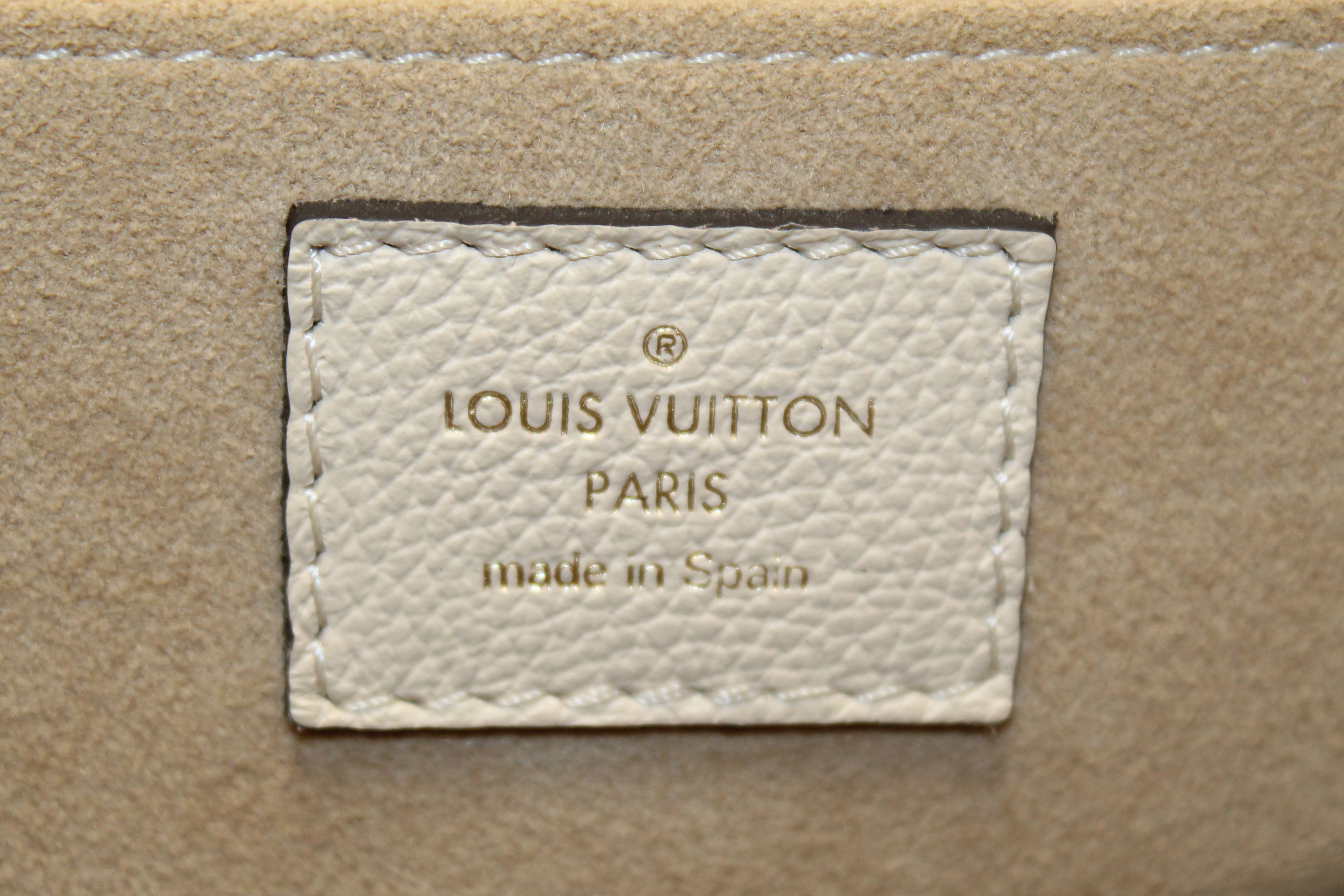 Authentic Louis Vuitton Classic Monogram Canvas with Creme Leather Vaugirard Bag
