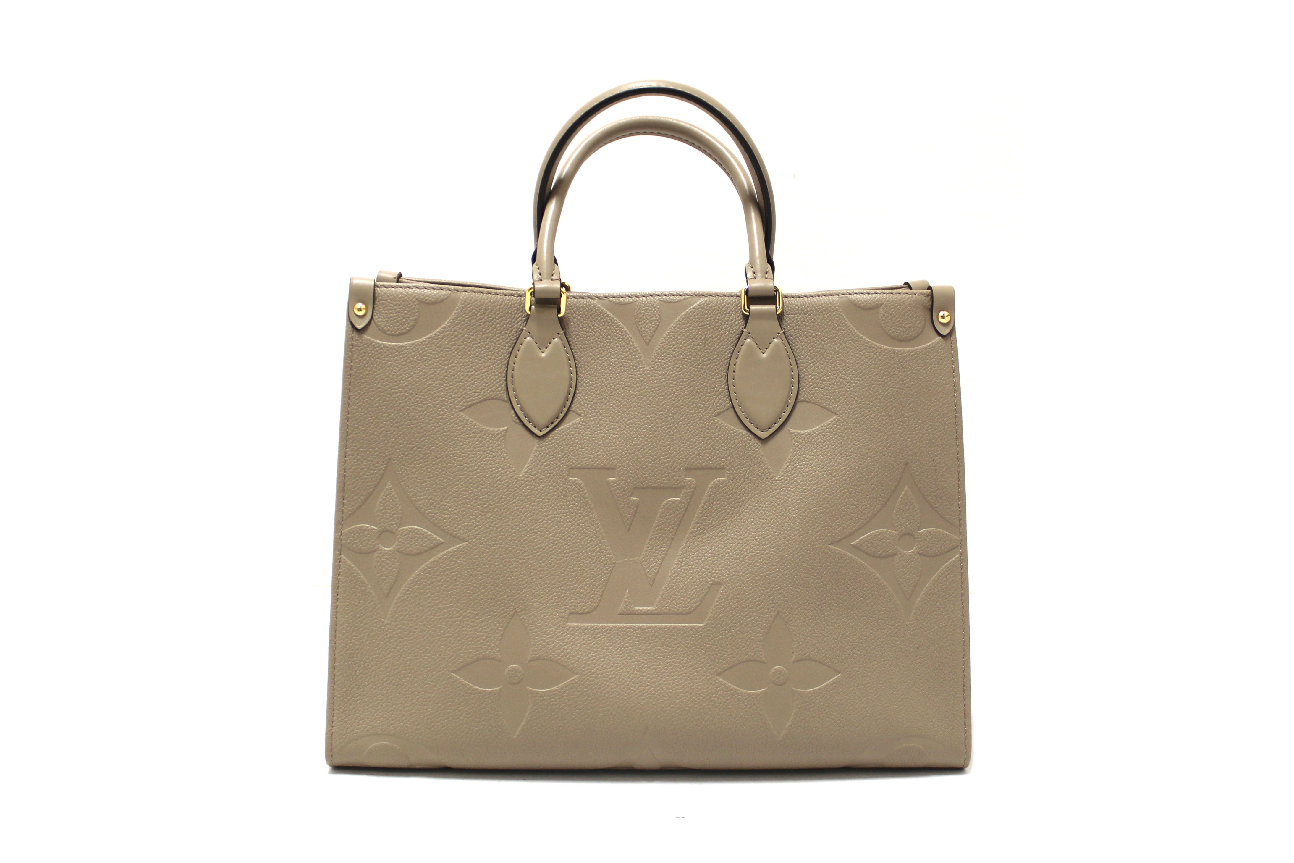 Authentic Louis Vuitton Turtledove Monogram Empreinte Leather OnTheGo MM Tote Bag
