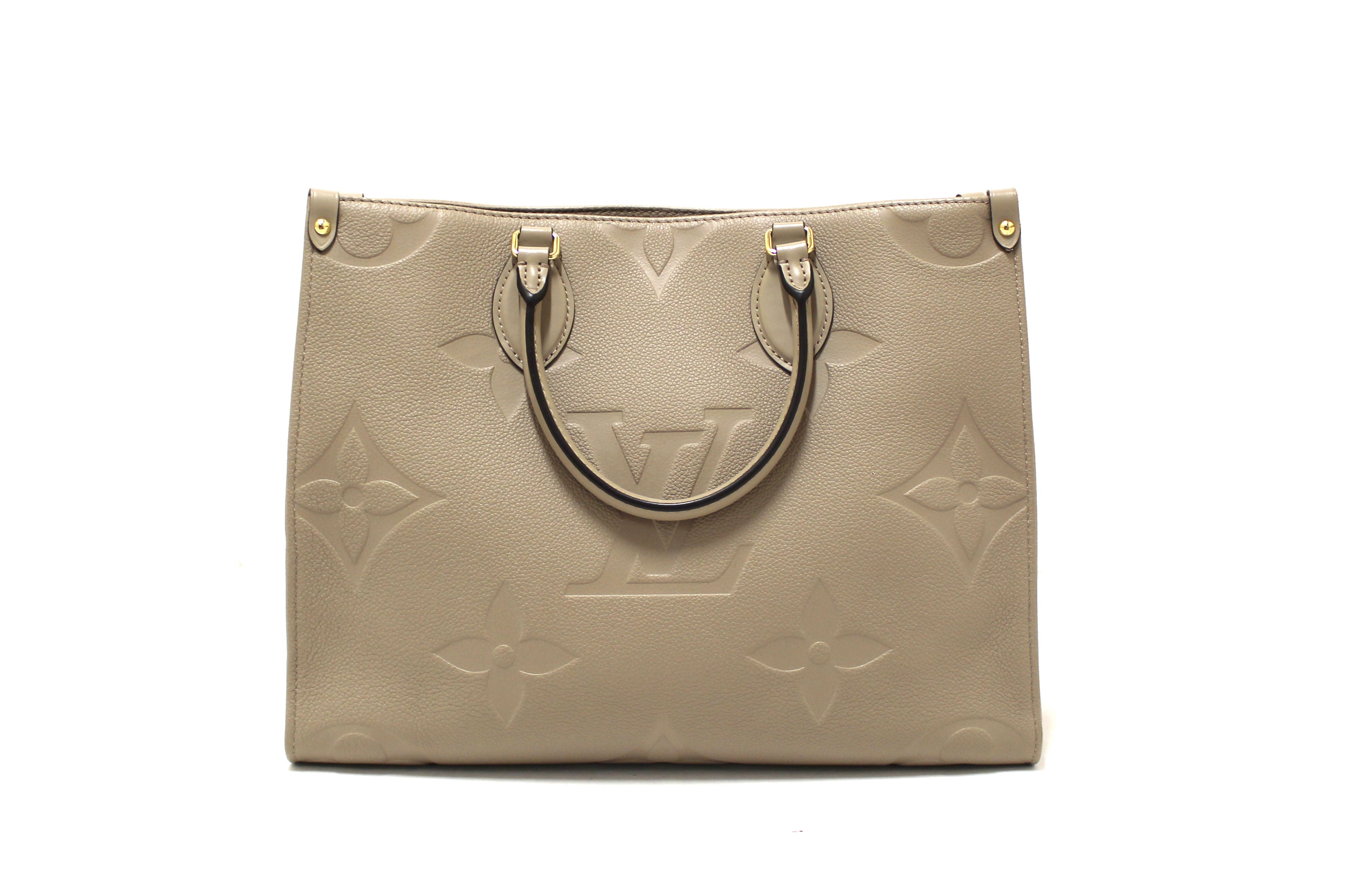 Authentic Louis Vuitton Turtledove Monogram Empreinte Leather OnTheGo MM Tote Bag