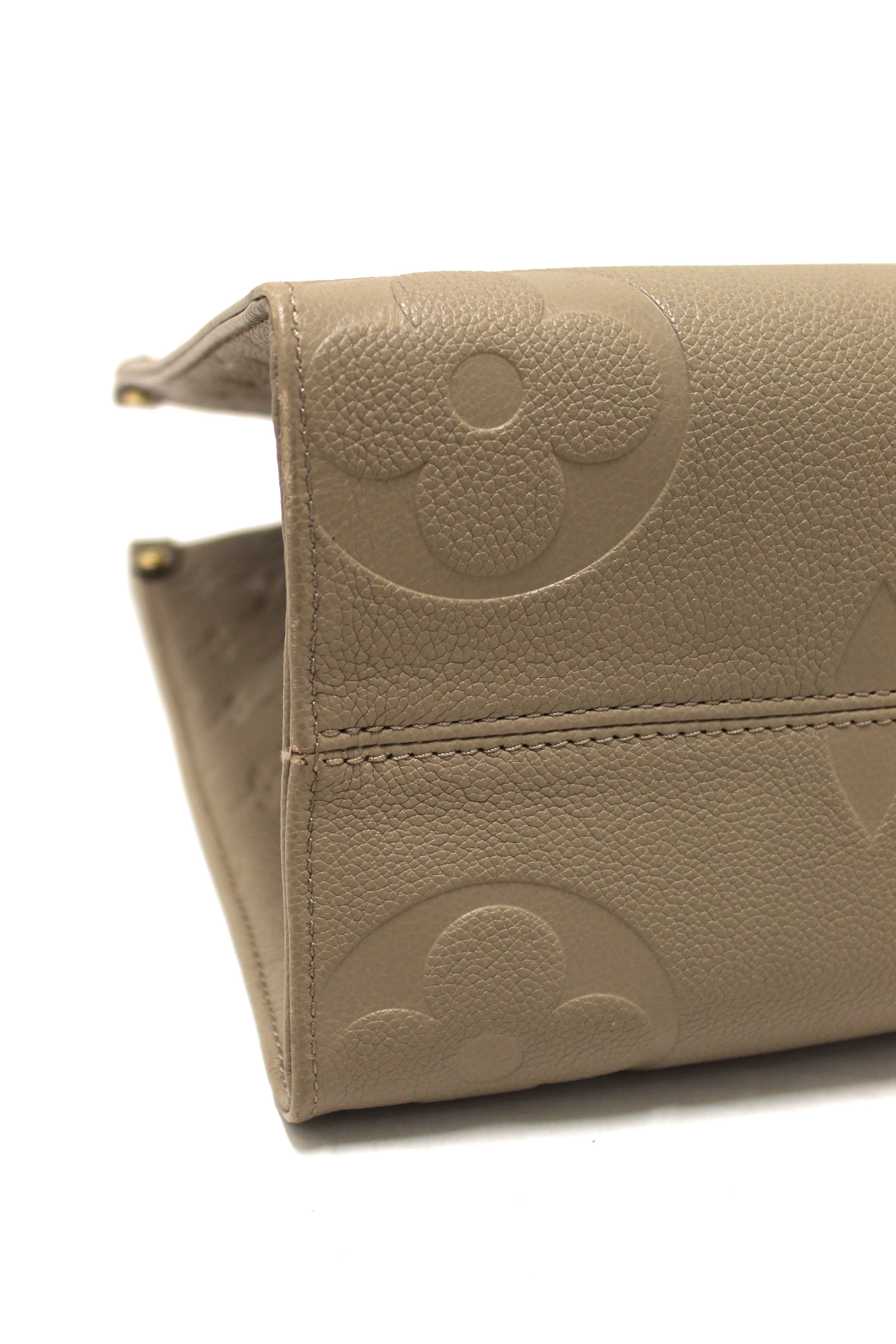 Authentic Louis Vuitton Turtledove Monogram Empreinte Leather OnTheGo MM Tote Bag