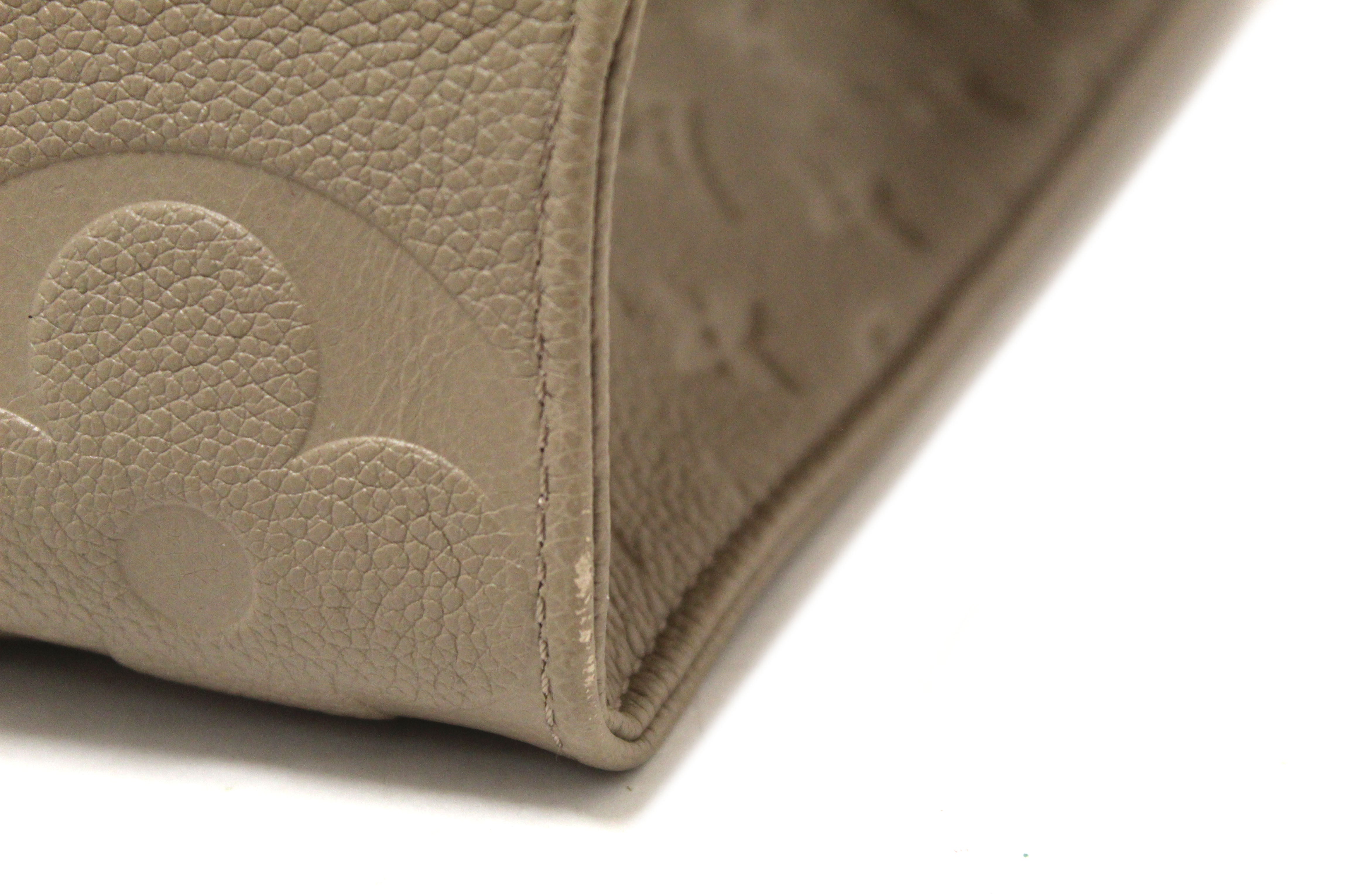 Authentic Louis Vuitton Turtledove Monogram Empreinte Leather OnTheGo MM Tote Bag