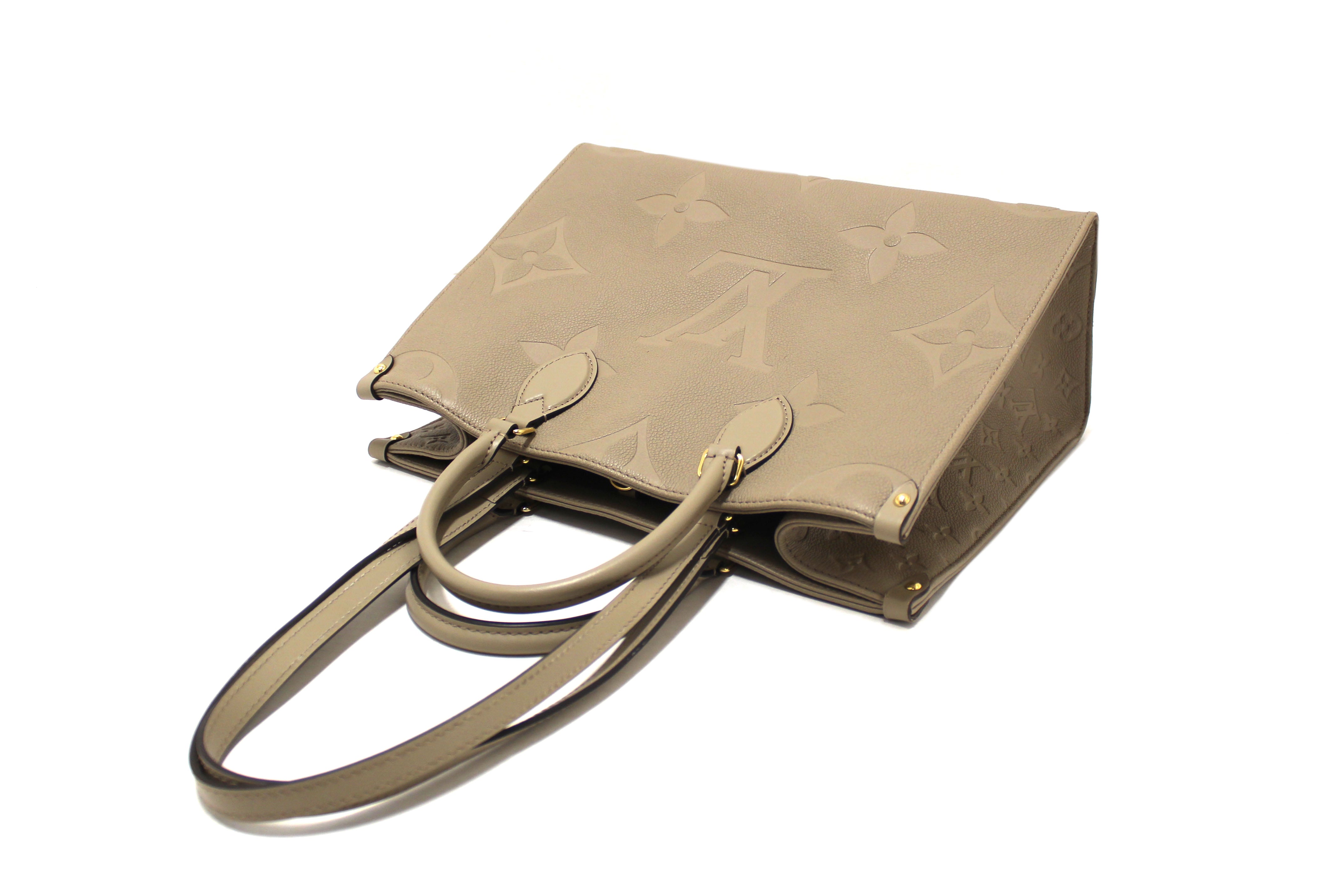 Authentic Louis Vuitton Turtledove Monogram Empreinte Leather OnTheGo MM Tote Bag
