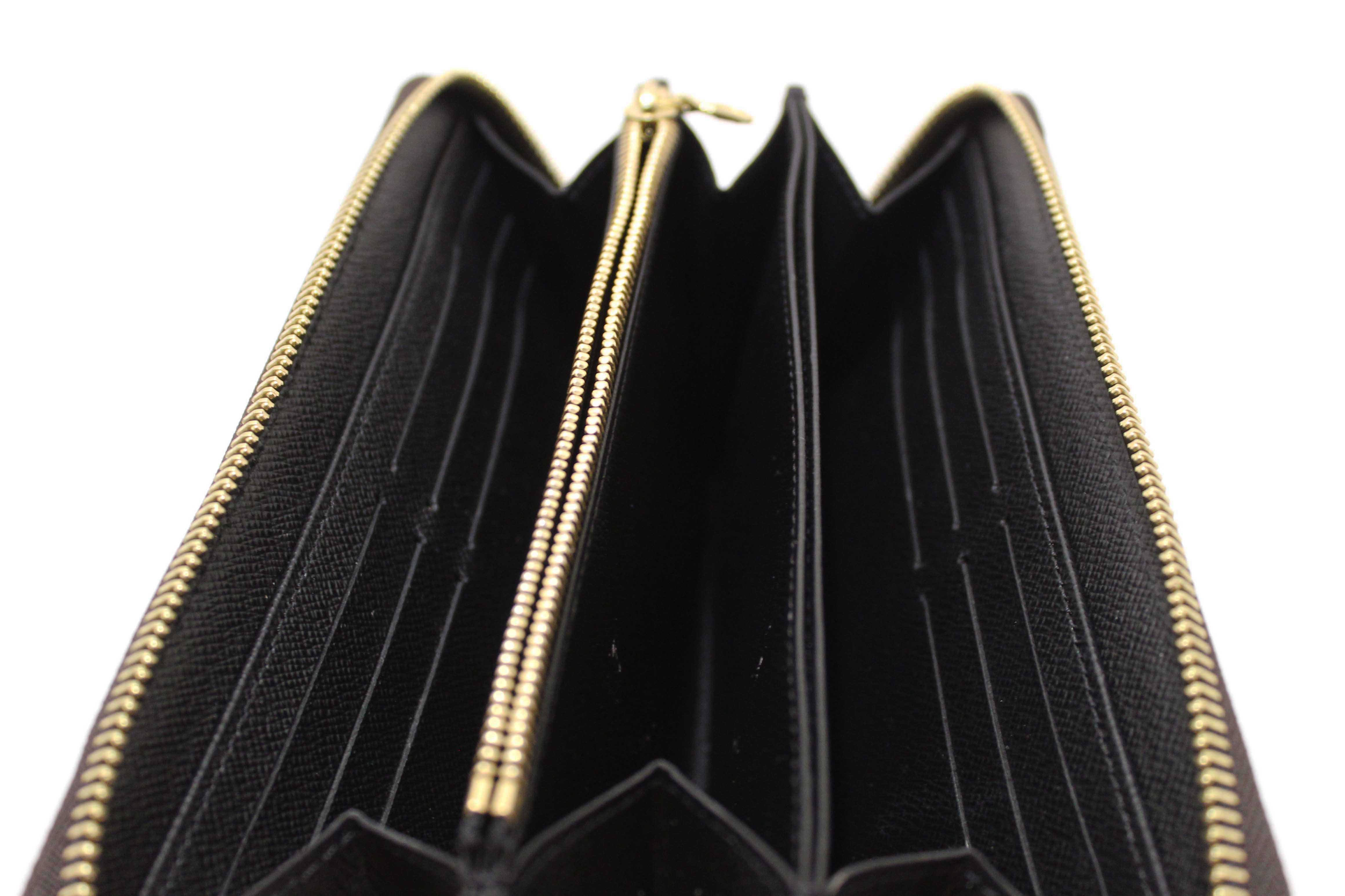 Authentic Louis Vuitton Giant Monogram Reverse Canvas Zippy Wallet