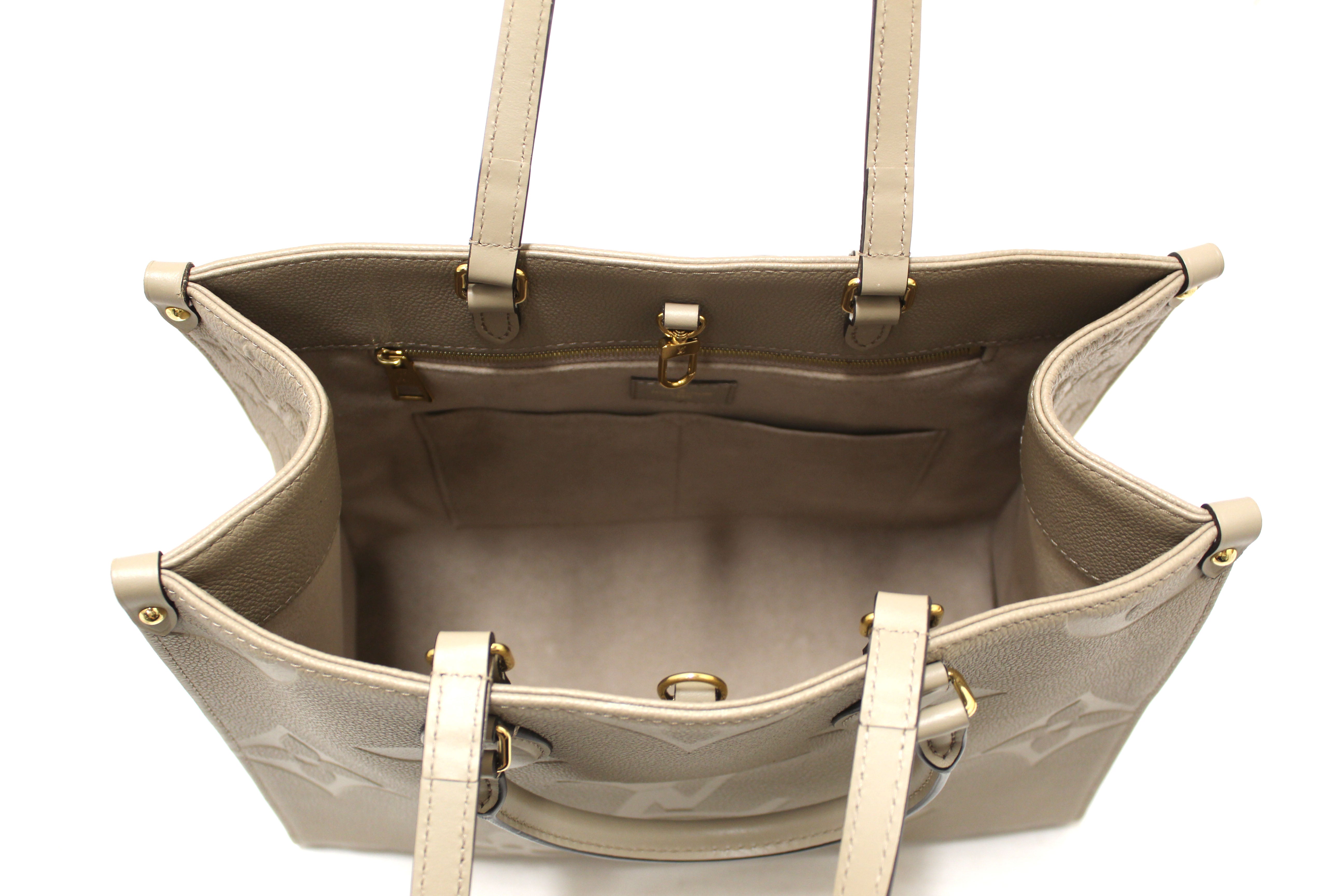 Authentic Louis Vuitton Turtledove Monogram Empreinte Leather OnTheGo MM Tote Bag