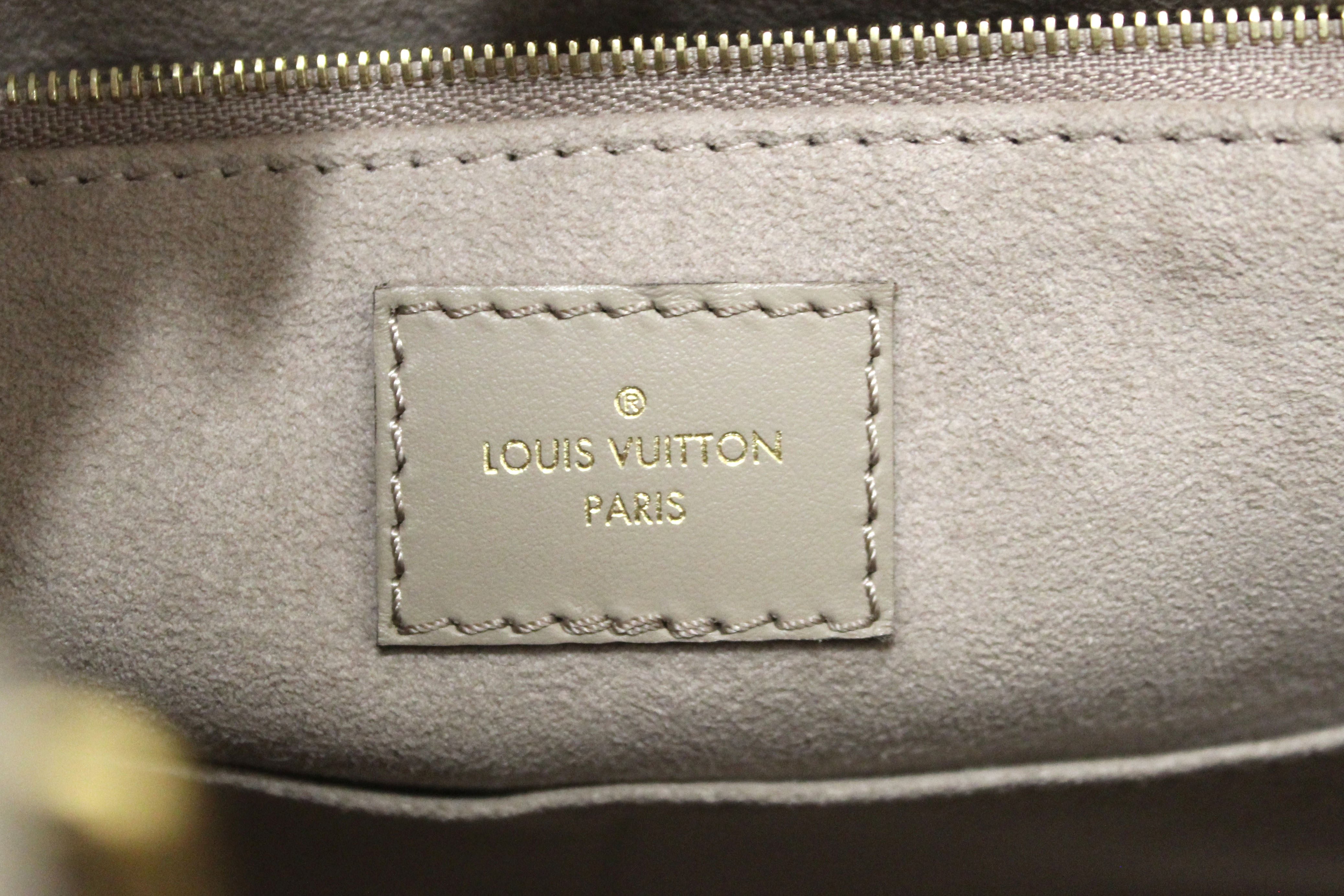 Authentic Louis Vuitton Turtledove Monogram Empreinte Leather OnTheGo MM Tote Bag