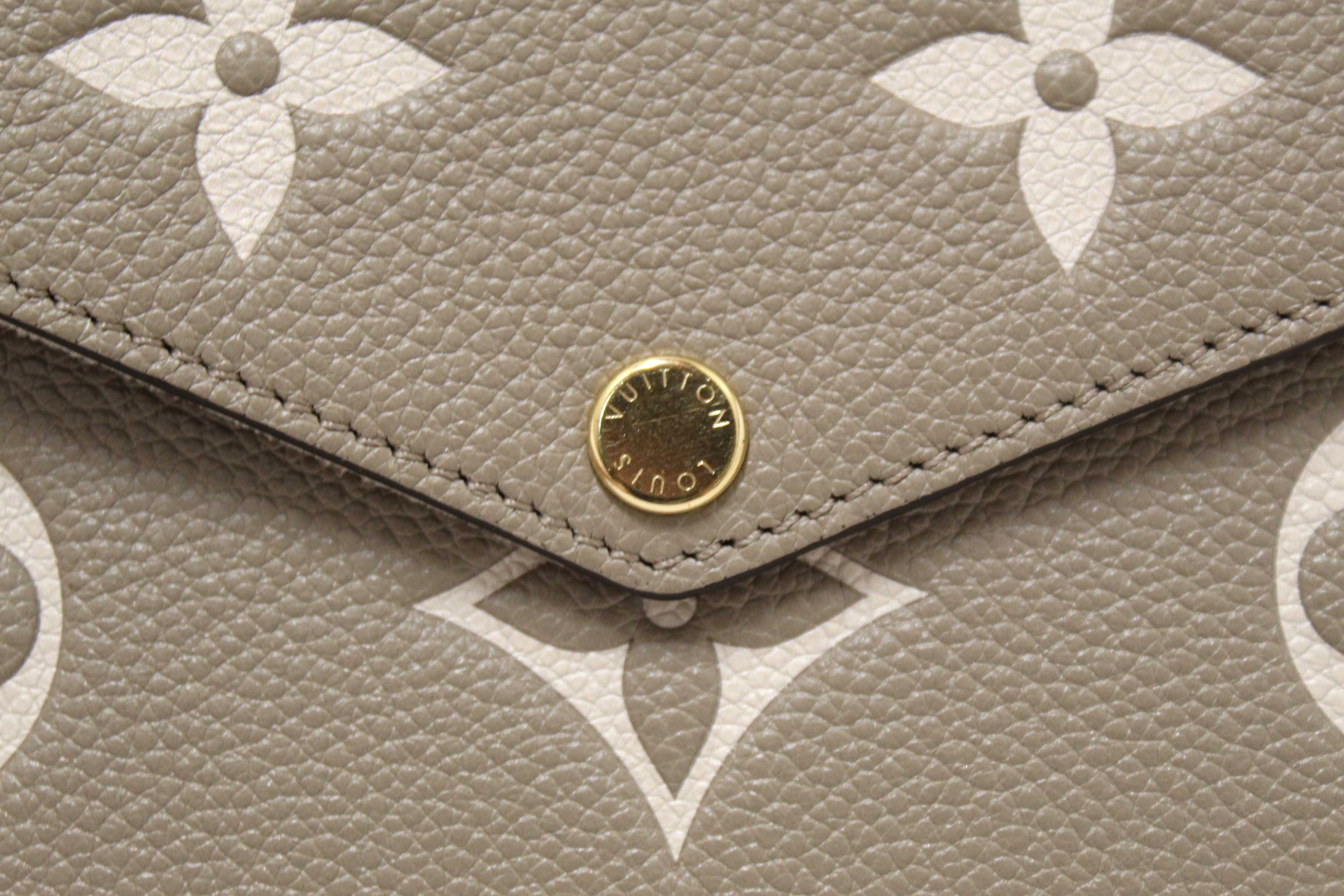 Authentic Louis Vuitton Cream/Dove Monogram Empreinte Felicie Pochette Bag