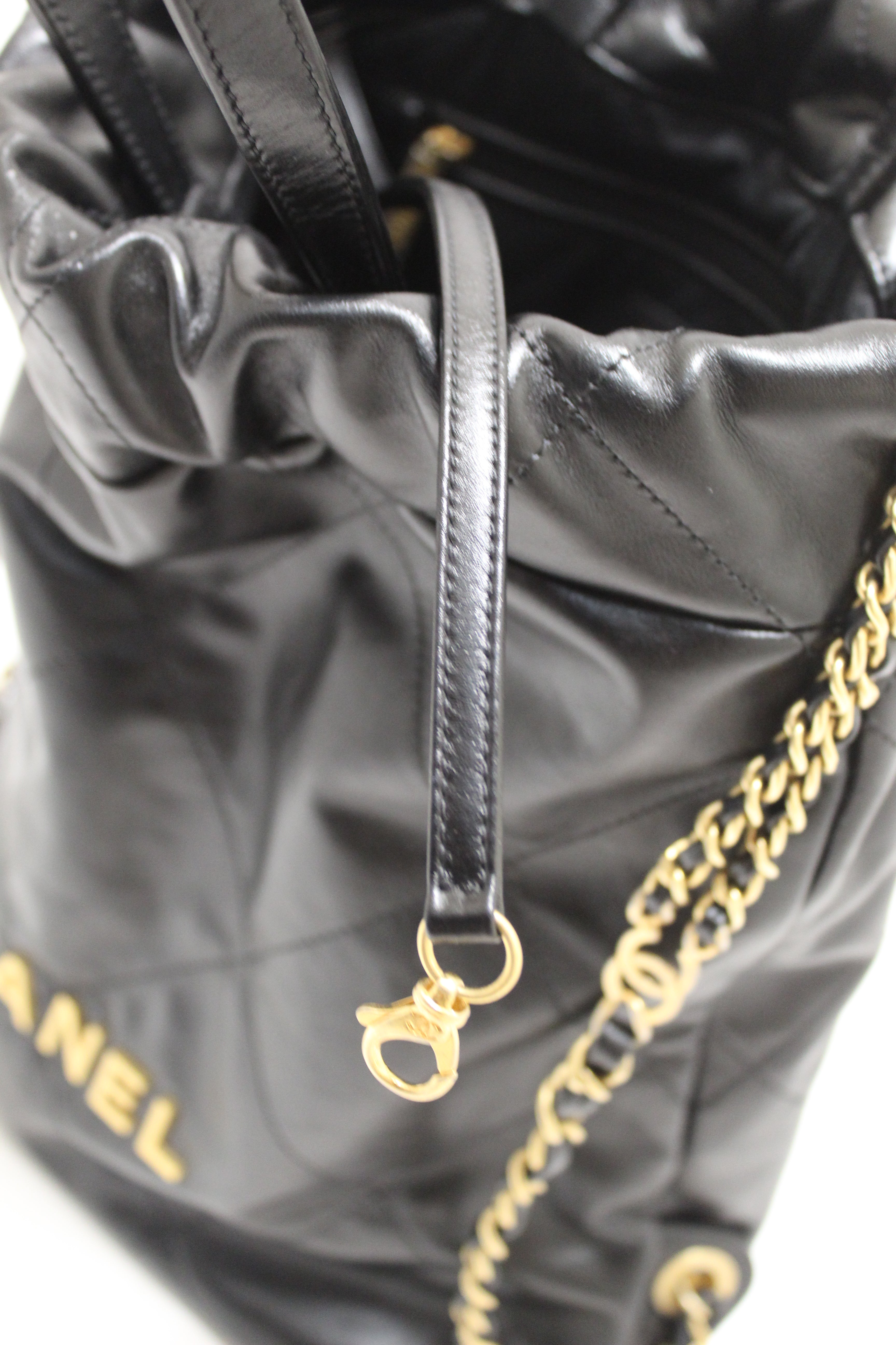 Authentic Chanel Black Chanel 22 Calfskin Leather Drawstring Chain Backpack