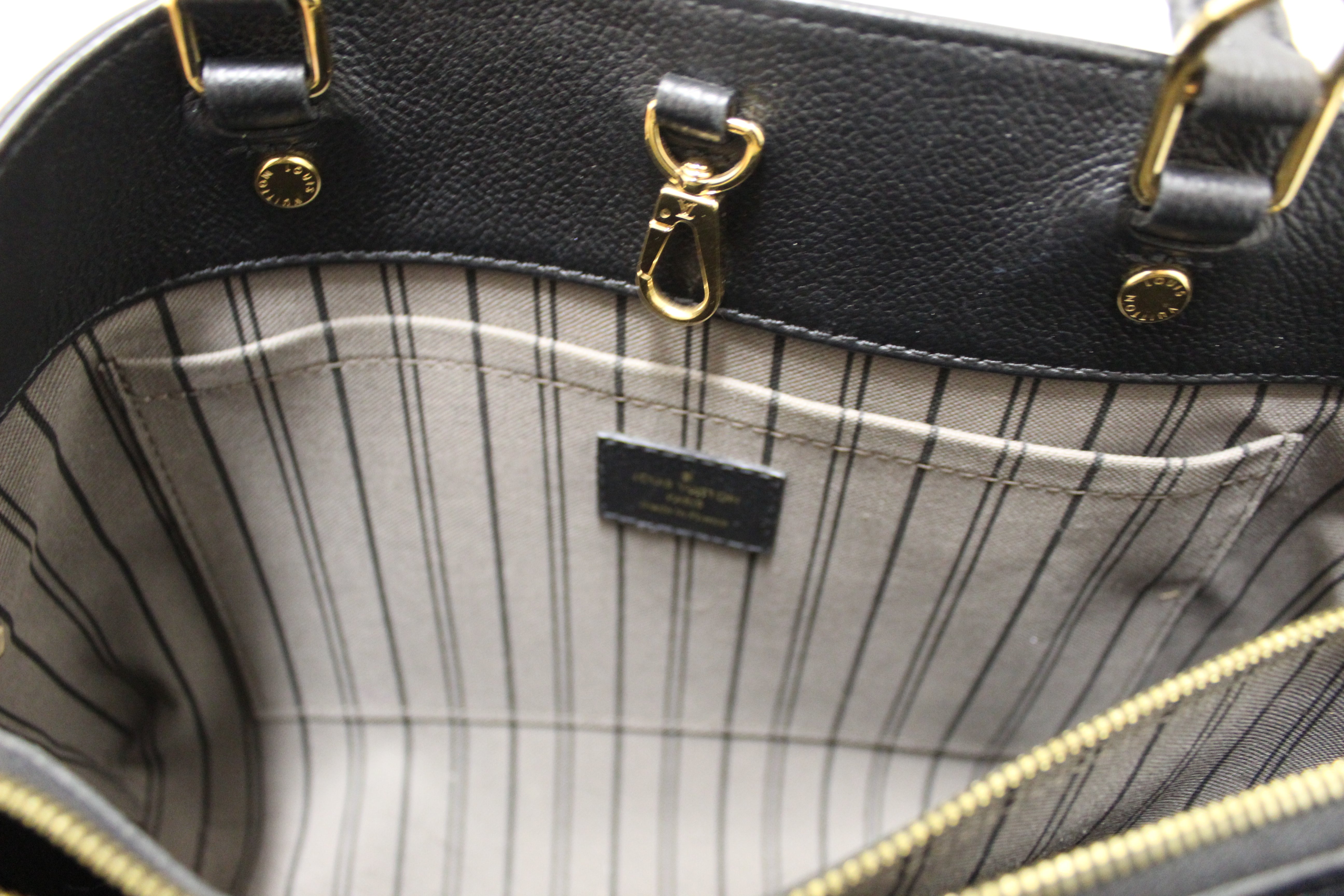Authentic Louis Vuitton Black Monogram Empreinte Leather Montaigne MM Bag