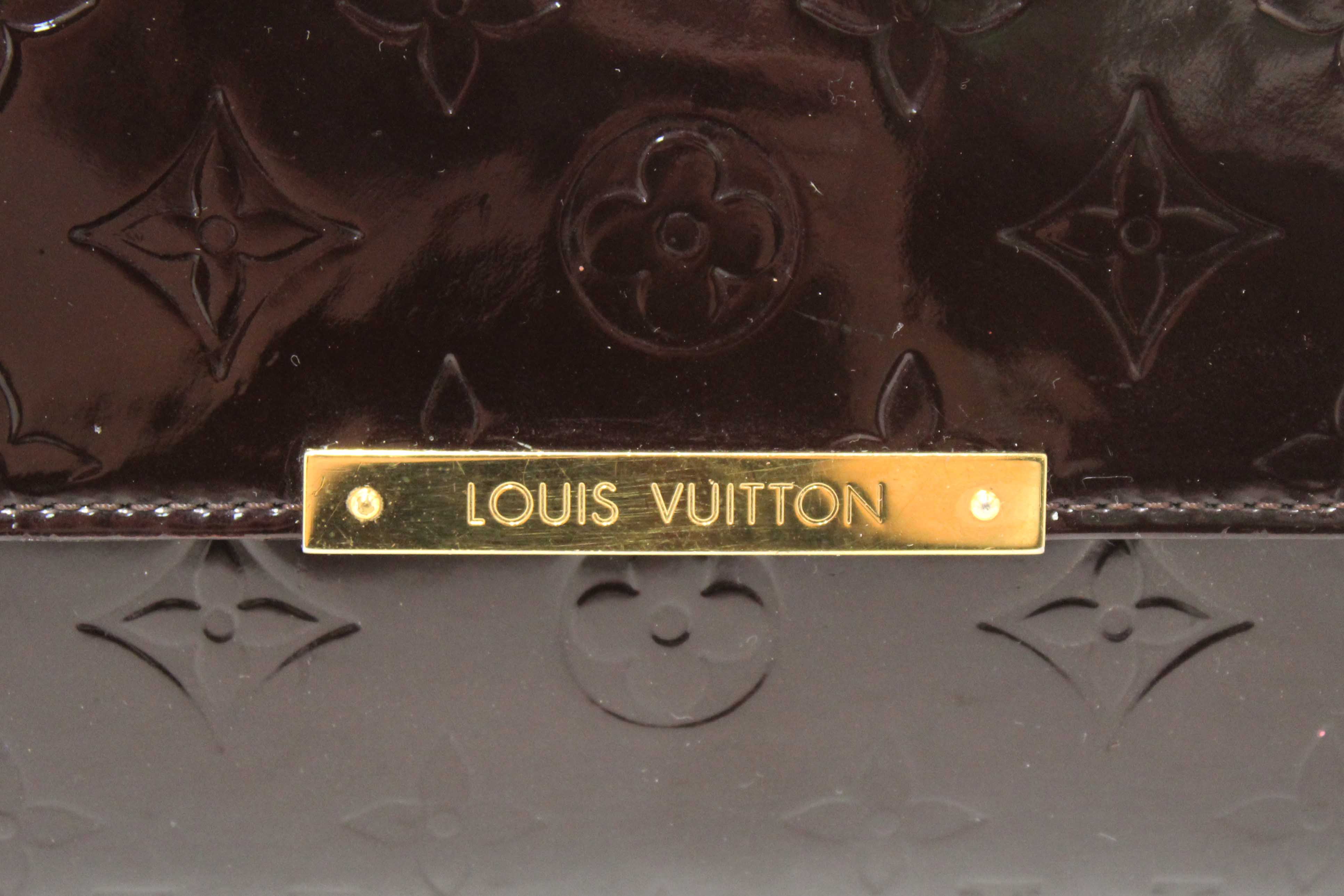 Authentic Louis Vuitton Amarante Monogram Vernis Leather Robertson Clutch