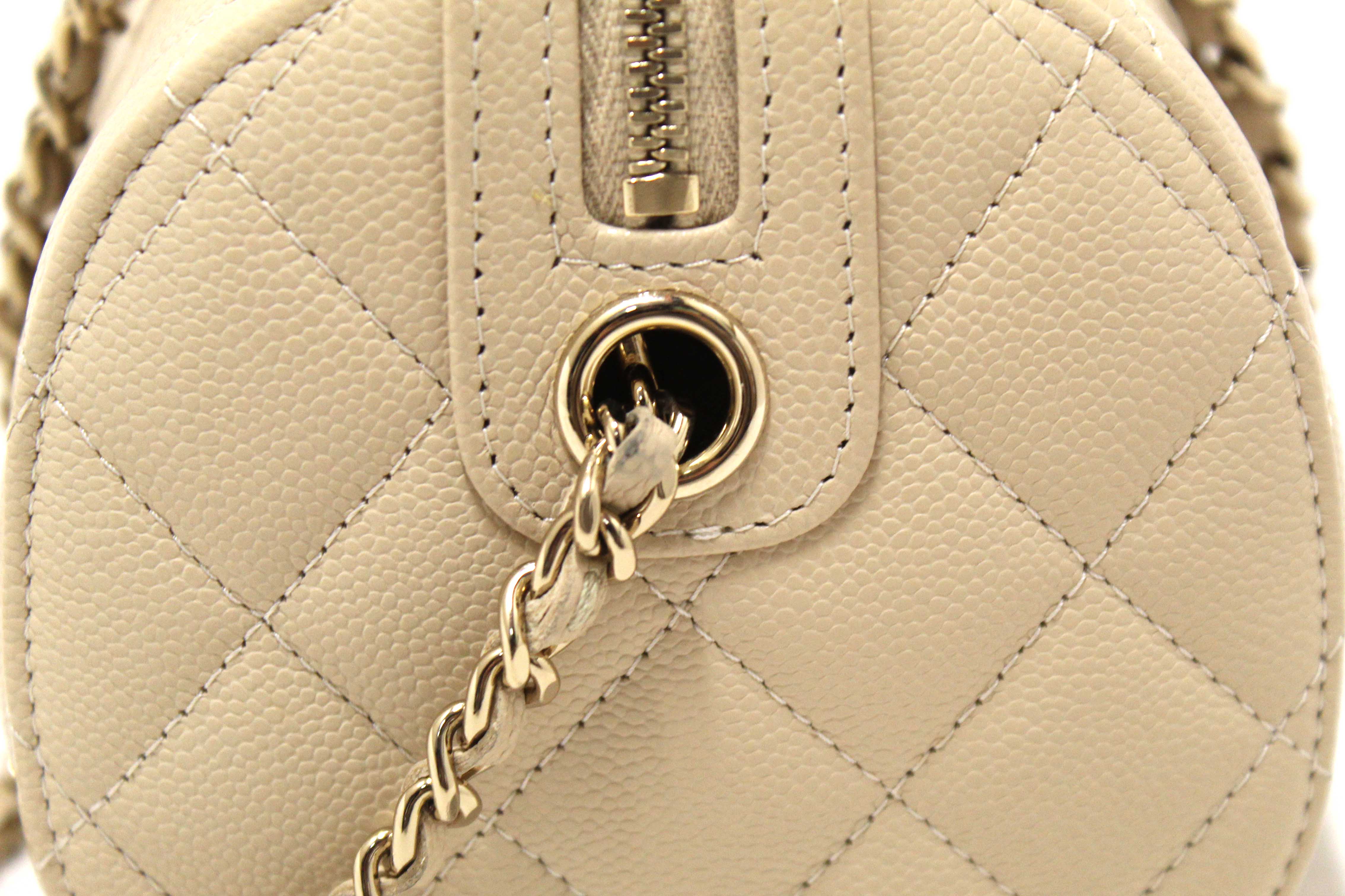 Authentic Chanel Beige Quilted Caviar Leather Mini Bowling with Chain Bag