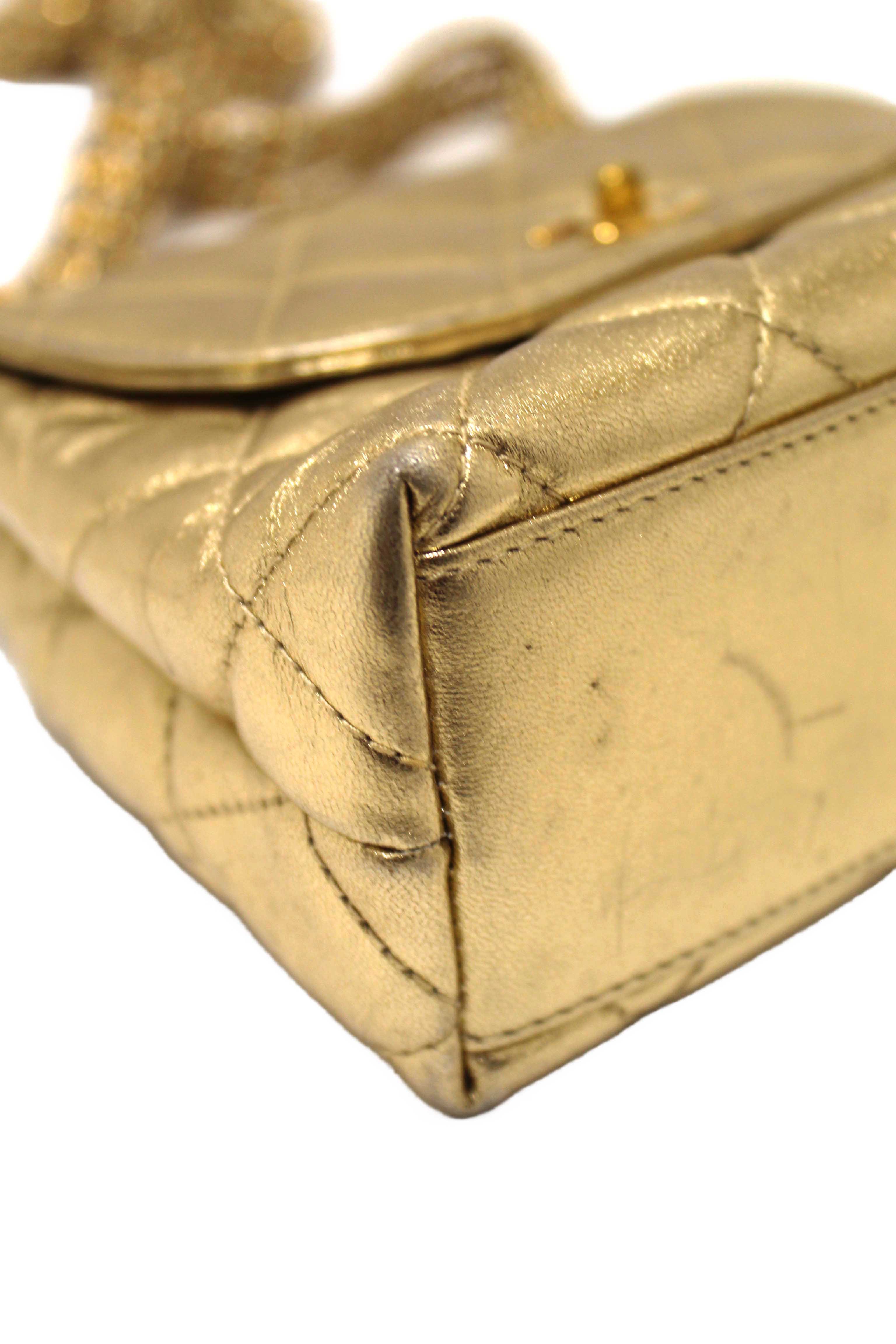 Authentic Chanel Vintage Gold Metallic Quilted Lambskin Leather Multi Chain CC Mini Round Flap Bag