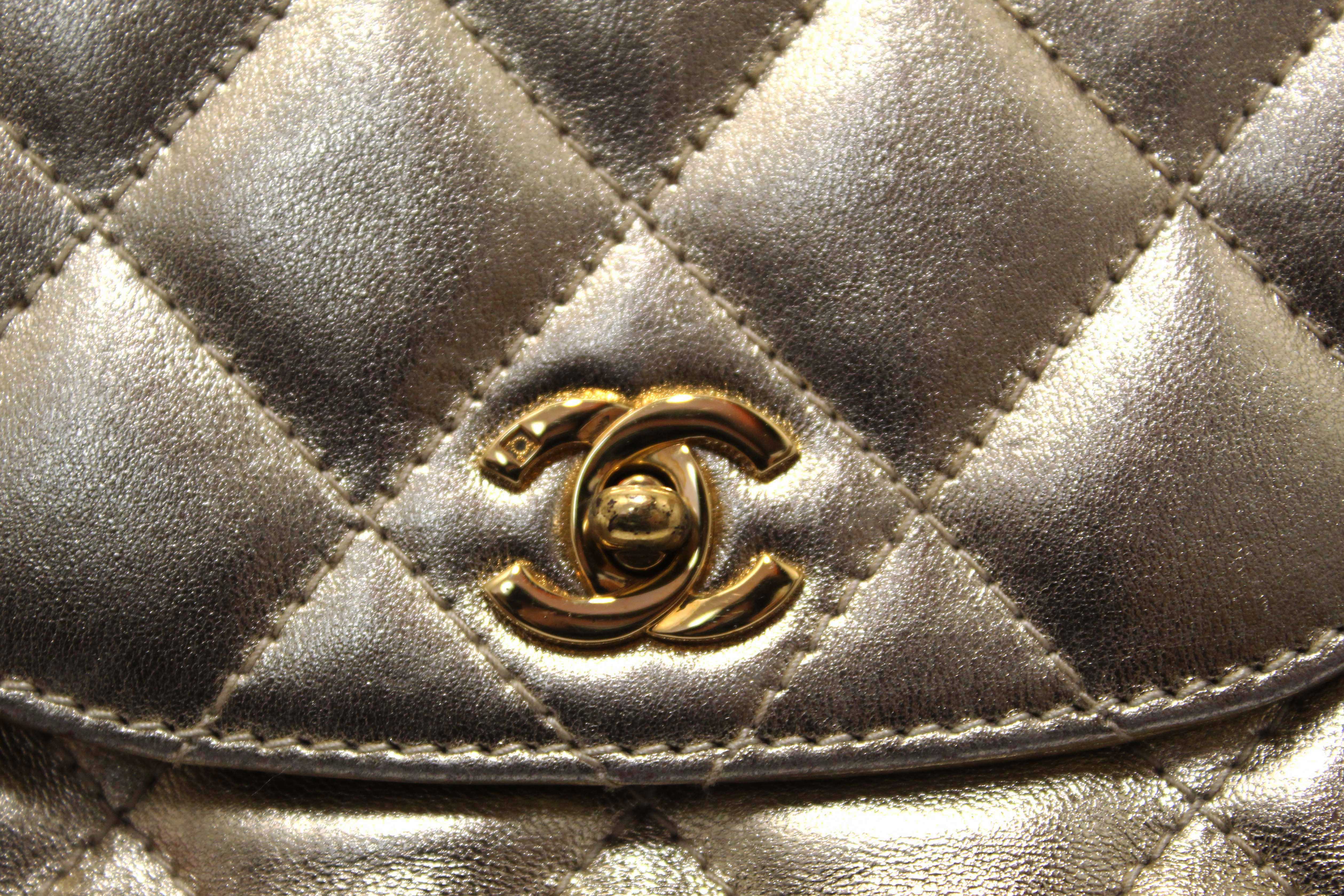 Authentic Chanel Vintage Gold Metallic Quilted Lambskin Leather Multi Chain CC Mini Round Flap Bag