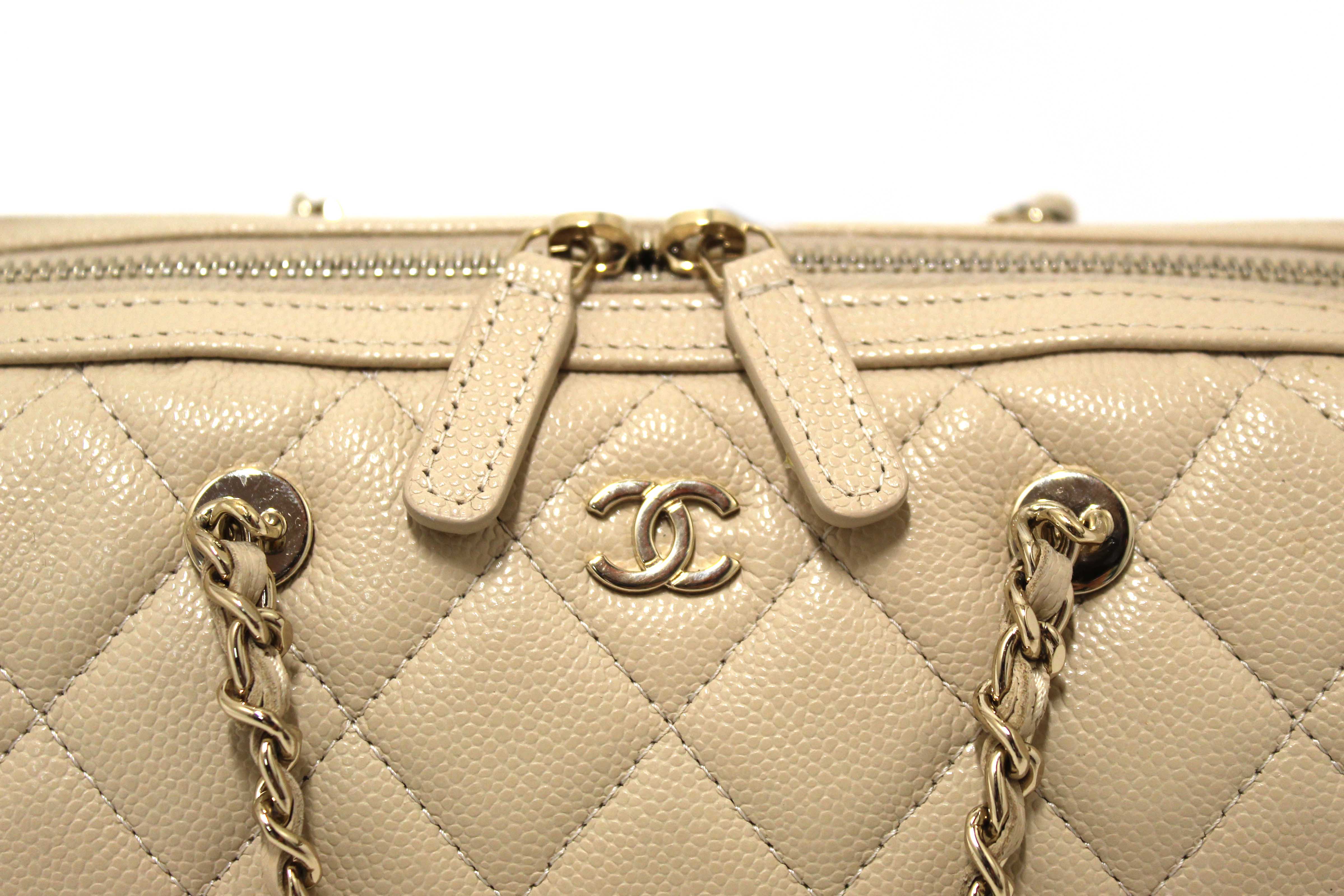 Authentic Chanel Beige Quilted Caviar Leather Mini Bowling with Chain Bag