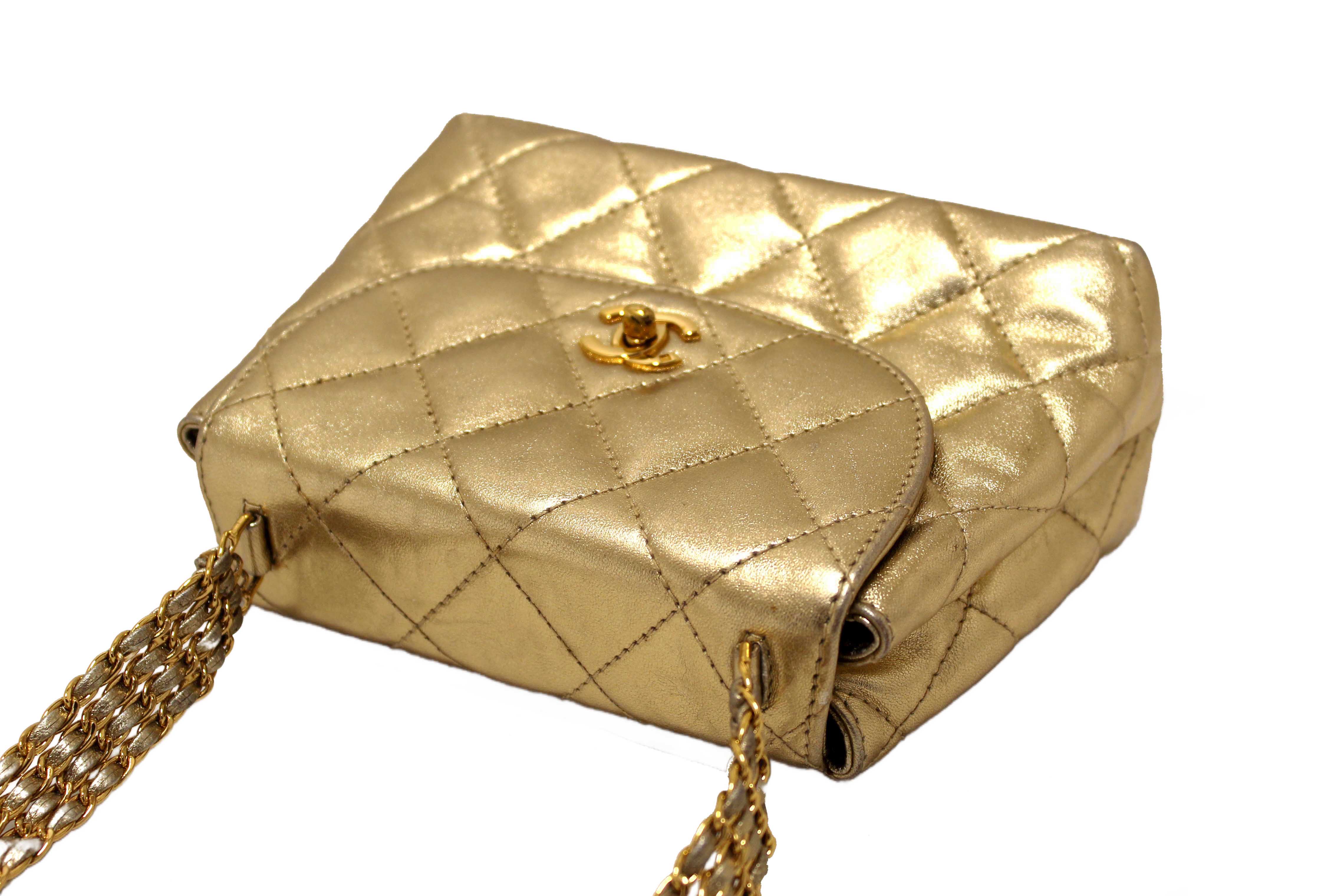 Authentic Chanel Vintage Gold Metallic Quilted Lambskin Leather Multi Chain CC Mini Round Flap Bag