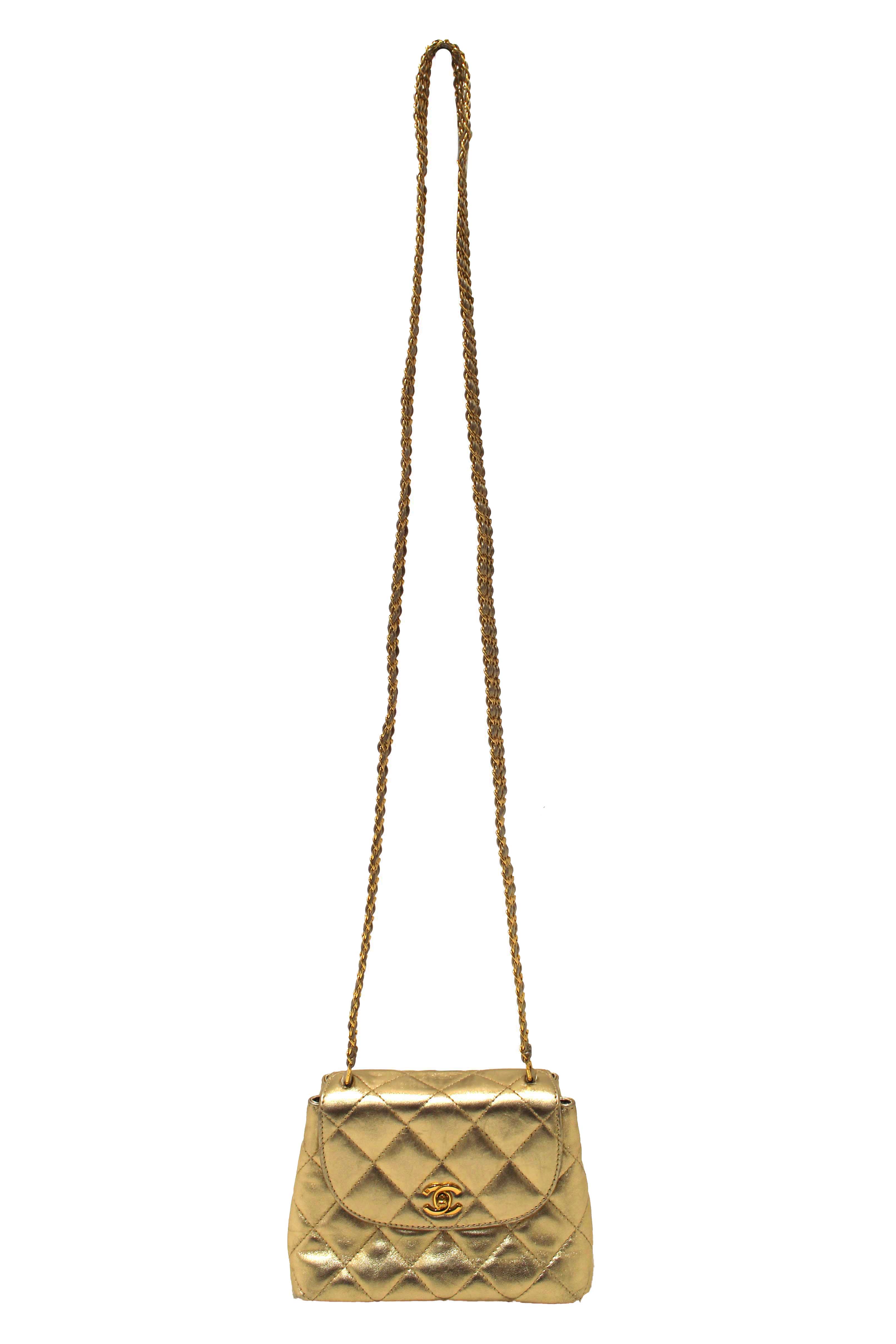 Authentic Chanel Vintage Gold Metallic Quilted Lambskin Leather Multi Chain CC Mini Round Flap Bag