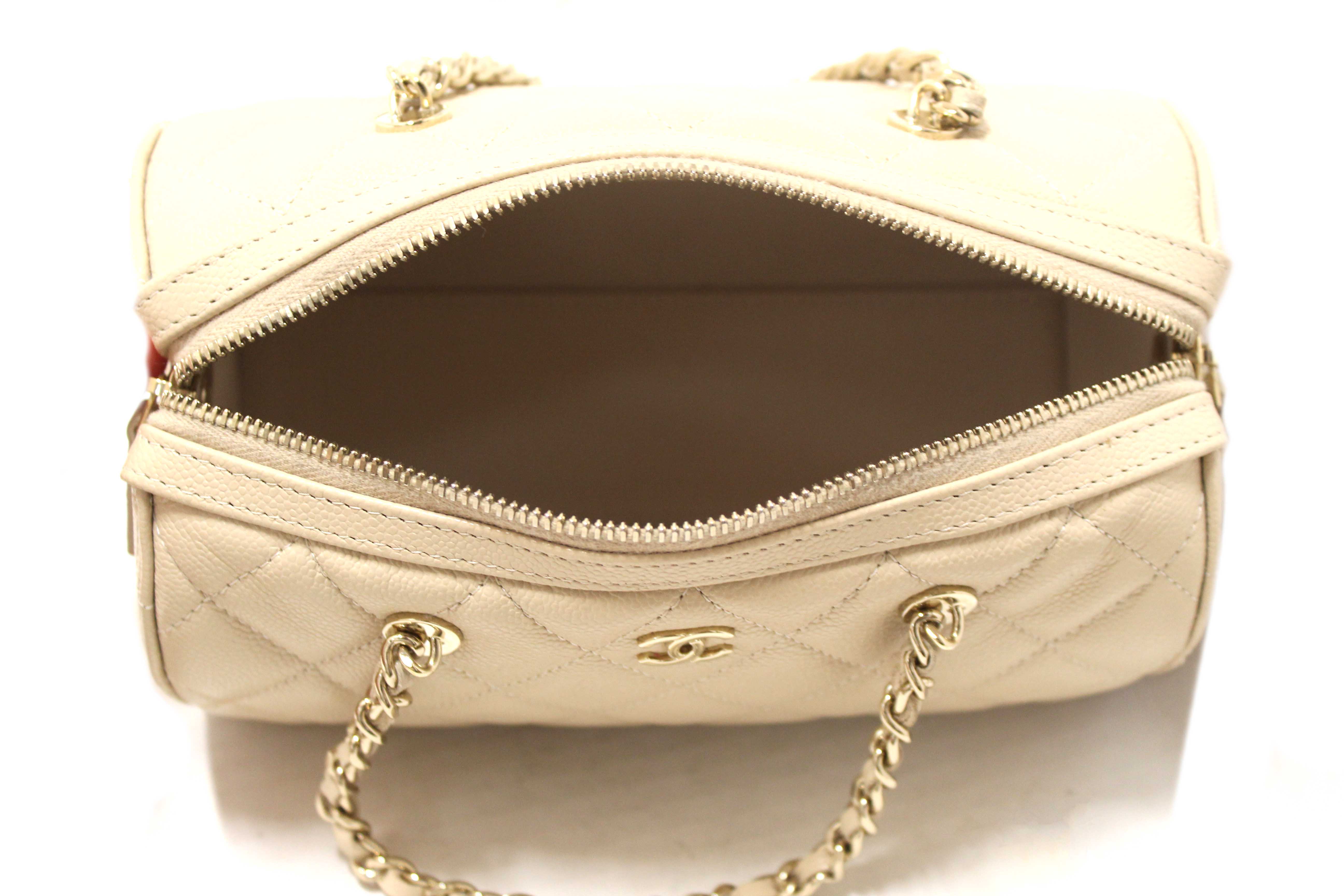 Authentic Chanel Beige Quilted Caviar Leather Mini Bowling with Chain Bag